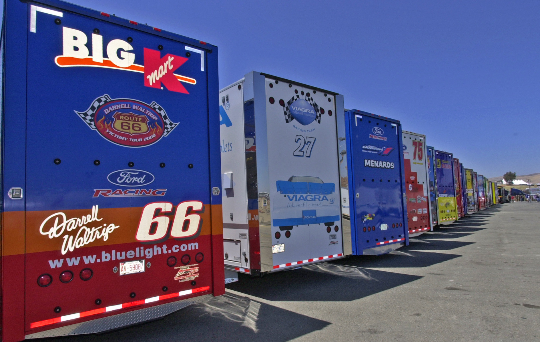 NASCAR Team Haulers lined up in the Garage area at Sears Point... ©  IAN DONALD