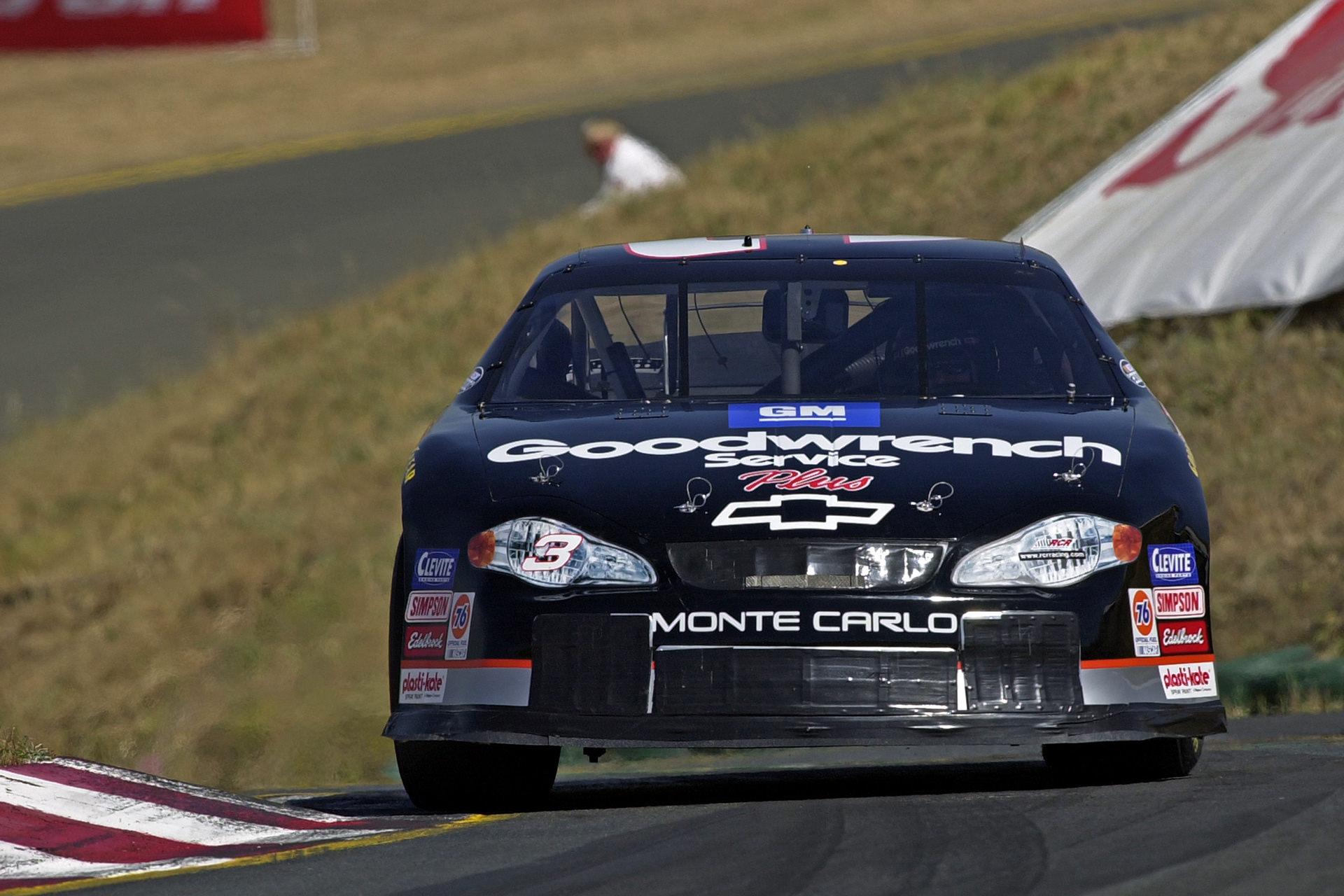 Dale Earnhardt taking a smooth line through Turn 3 at Sears.  ©  IAN DONALD