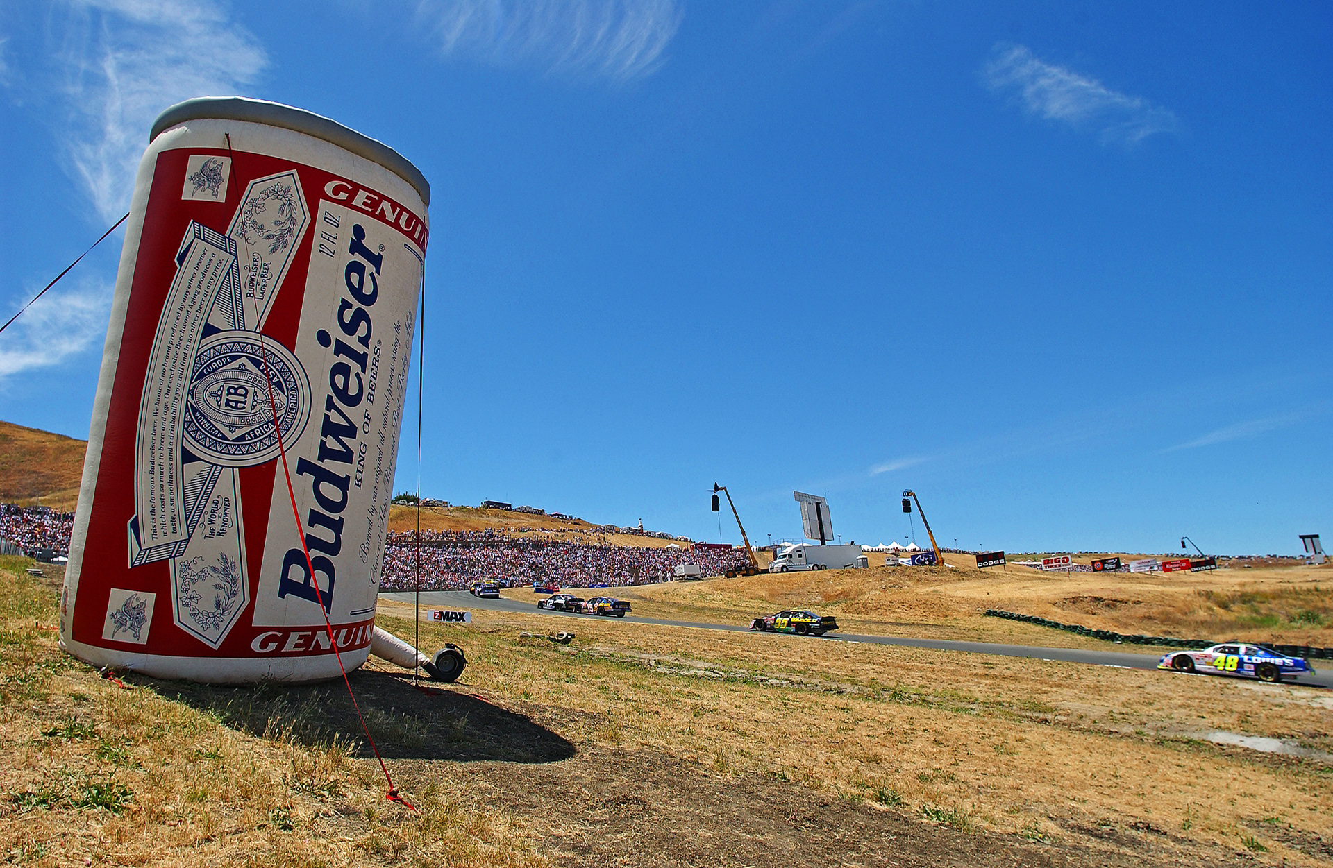  After a hot afternoon spent  hauling heavy photo gear around Sears Point a "cold one" could taste pretty good...  ©  IAN DONALD