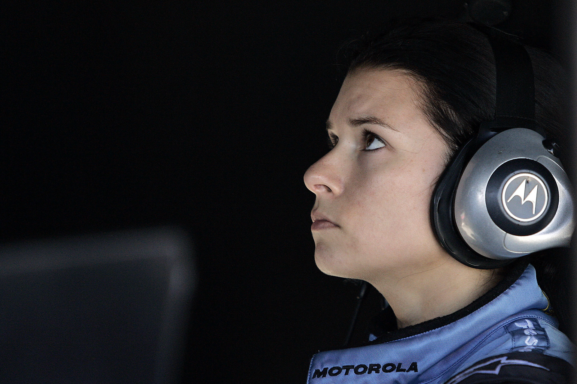 Danica Patrick watching the data screens in the Andretti Team Pit.  ©  IAN DONALD