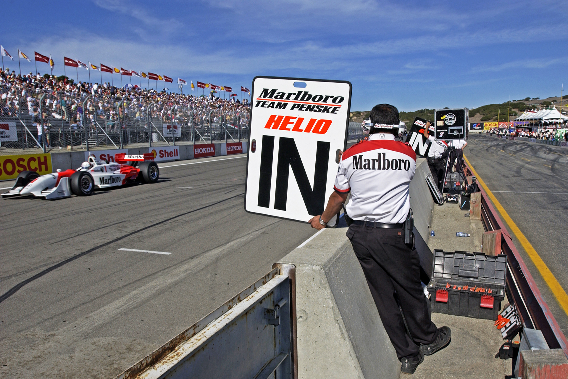 Helio Castroneves gets the Pit call at Laguna Seca...  ©  IAN DONALD