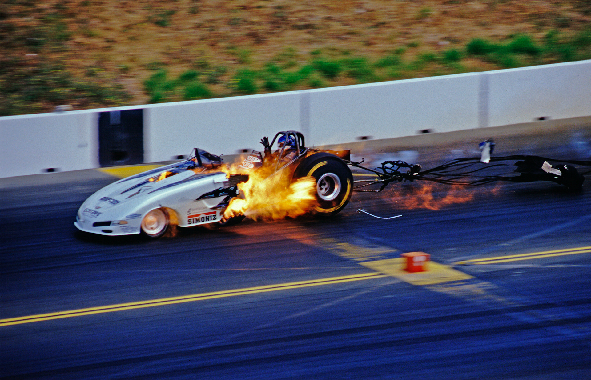1999 Sonoma Nationals - A Funny Car motor explodes as it crosses the finish line at over 250mph...... ©  IAN DONALD 