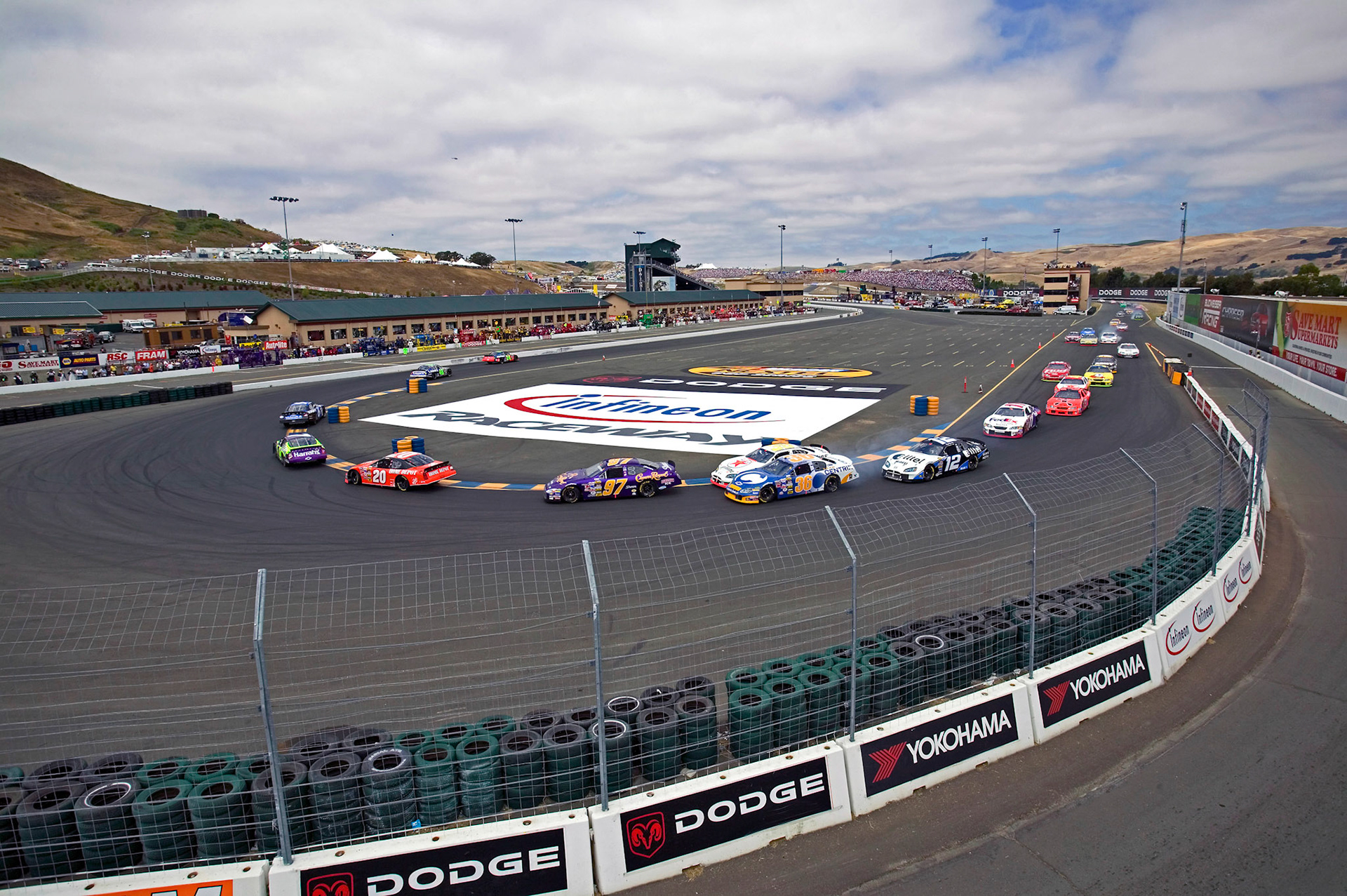 Jeff Gordon leads out of Turn 11 at Sonoma after a NASCAR restart.  ©  IAN DONALD