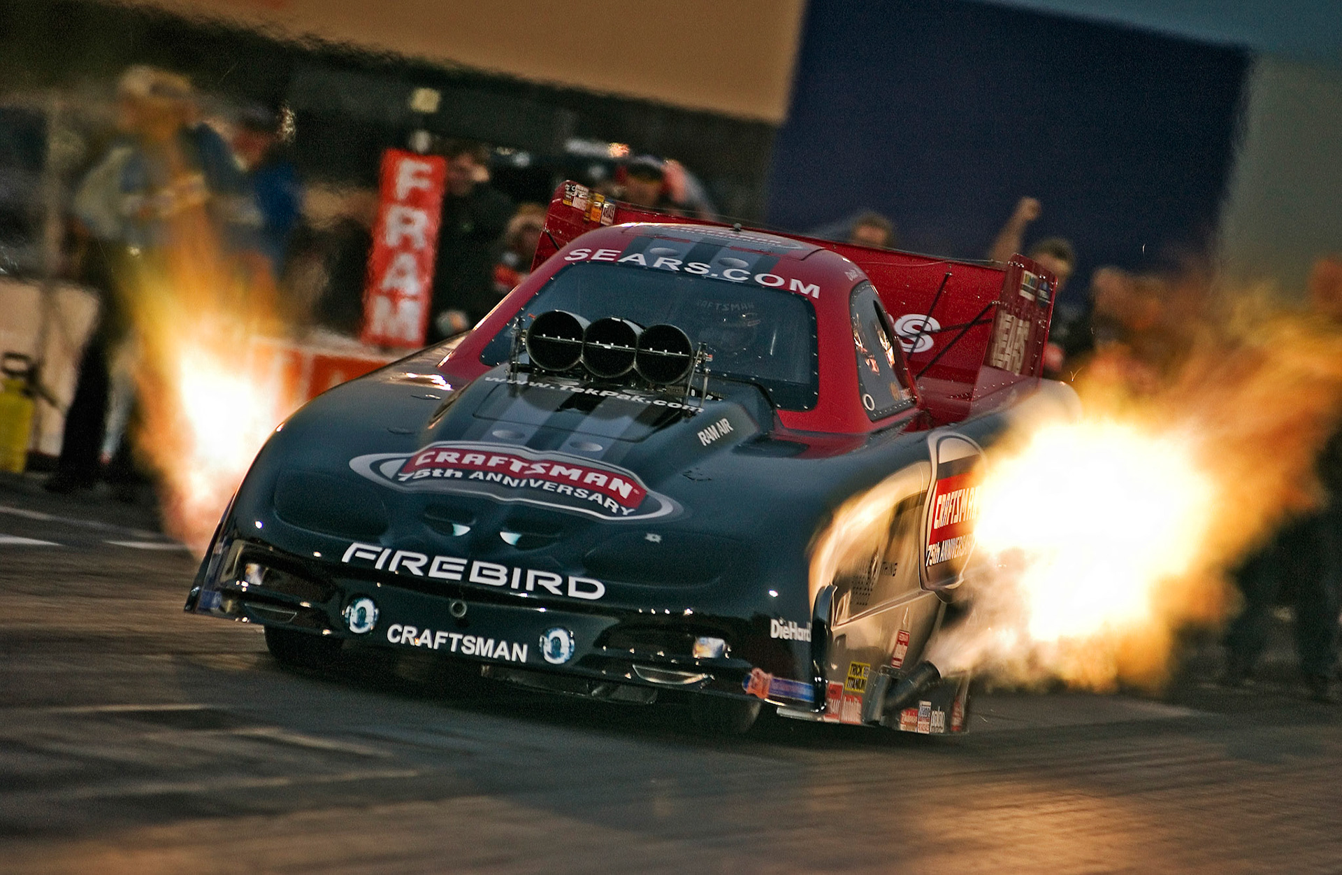 Dale Creasy Jr makes a nightime Funny Car run.  ©  IAN DONALD