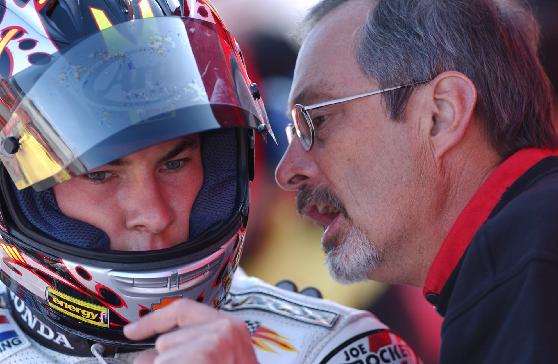 Nicky Hayden and Crew Chief Merlyn Plumlee. Honda Racing teammates who saw this photo in an exhibit in the Media Center said this is the first time young Nicky looked as if he was actually listening...  © IAN DONALD