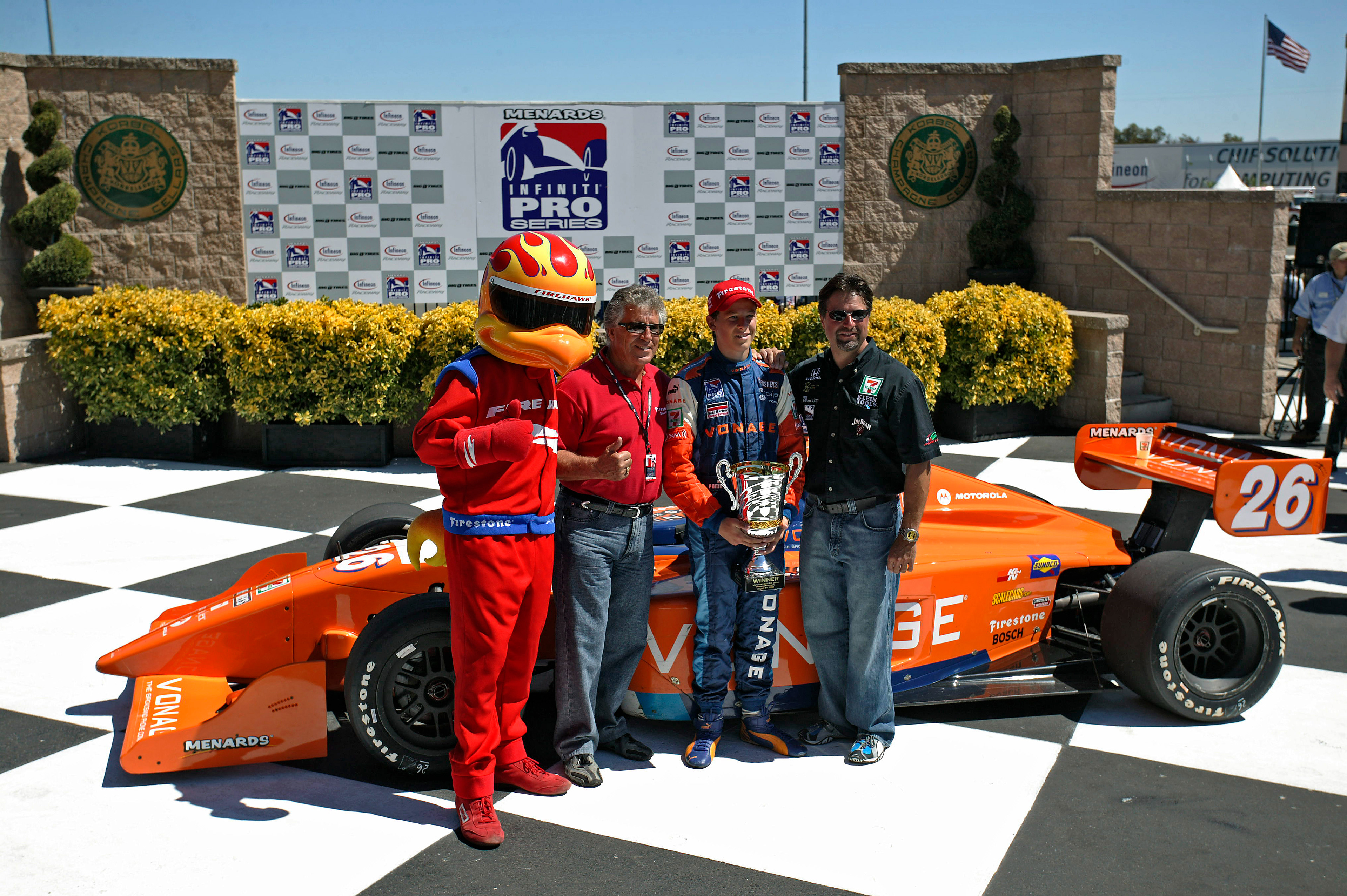 3 Generations of Andretti celebrate Marco's win in the Infiniti Pro Series.  ©  IAN DONALD
