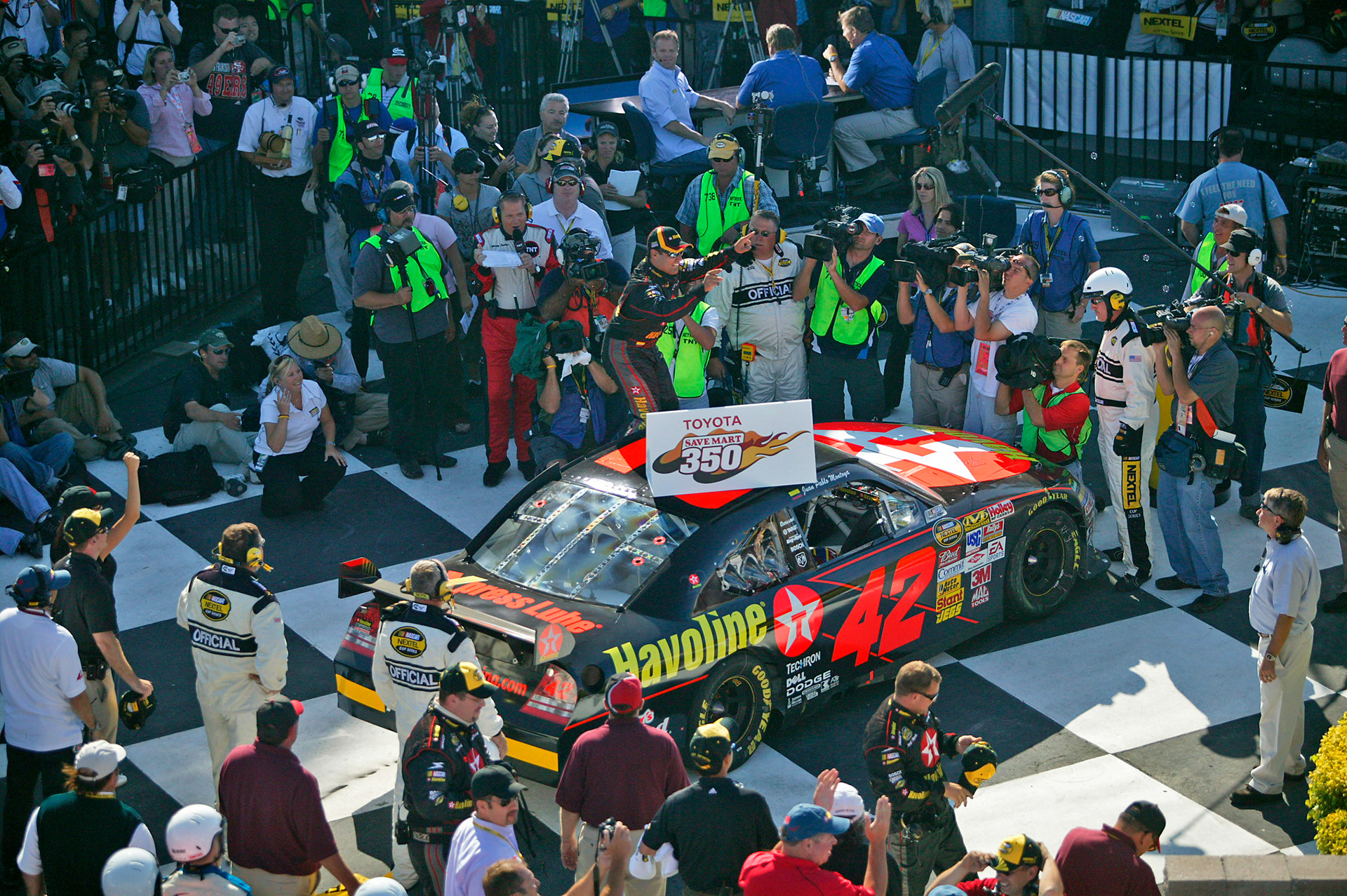 Juan Pablo Montoya arrives in Winner's Circle.  ©  IAN DONALD