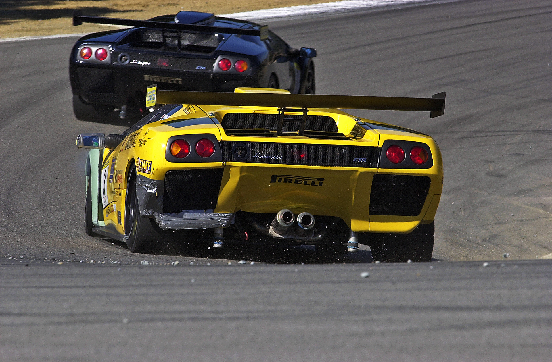 Lamborghini Diablos in "The Corkscrew" in a Lambo Challenge race - 2000.  ©  IAN DONALD