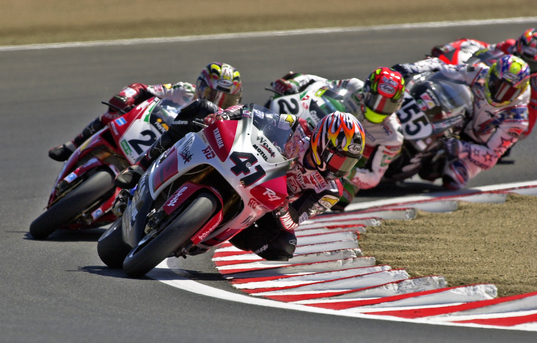 Noriuki Haga leads Troy Bayliss, Colin Edwards, Ben Bostrom & Troy Corser through Turn 2 at WSB Laguna  ©  IAN DONALD