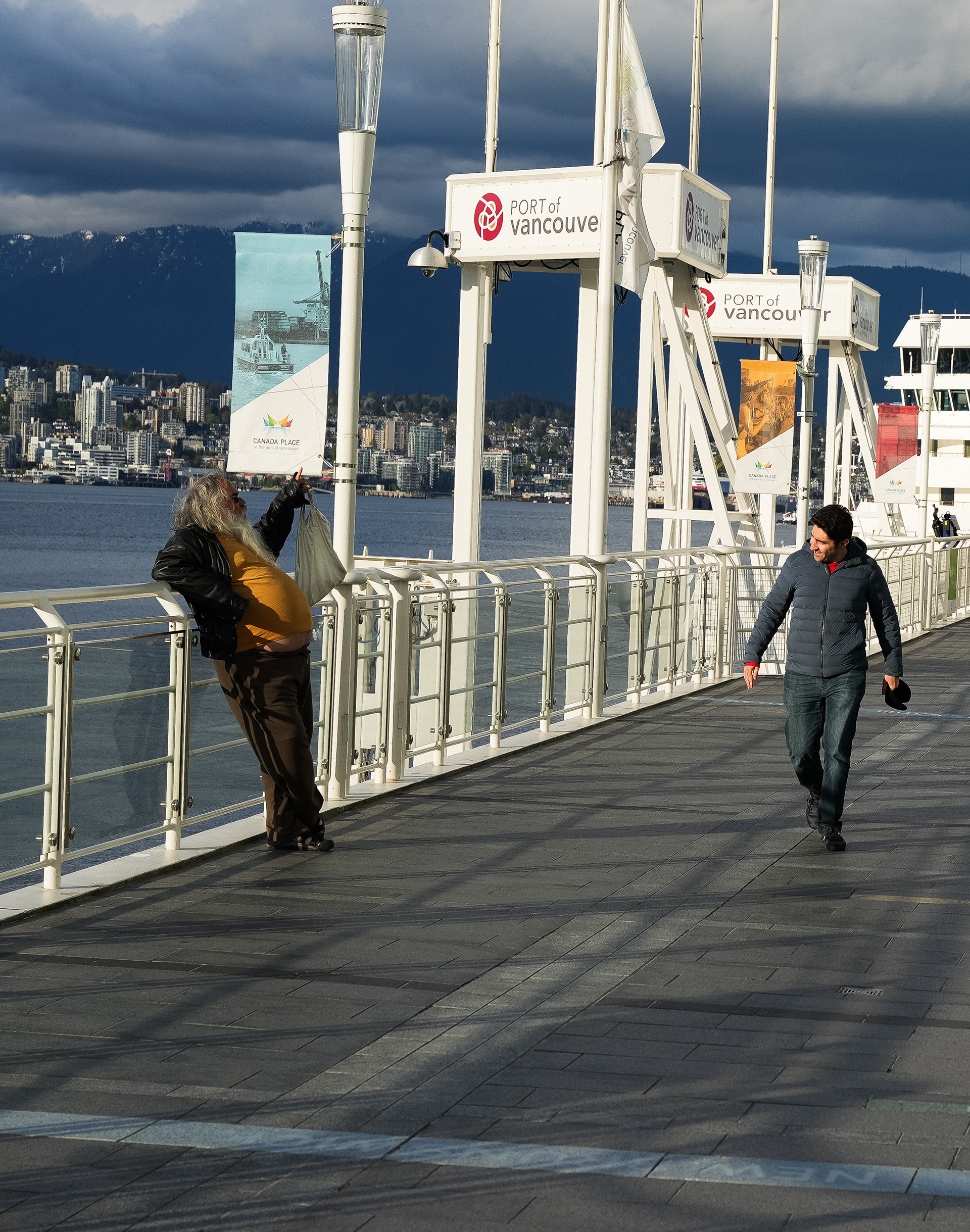 Two Men Chatting At Port Of Vancouver
