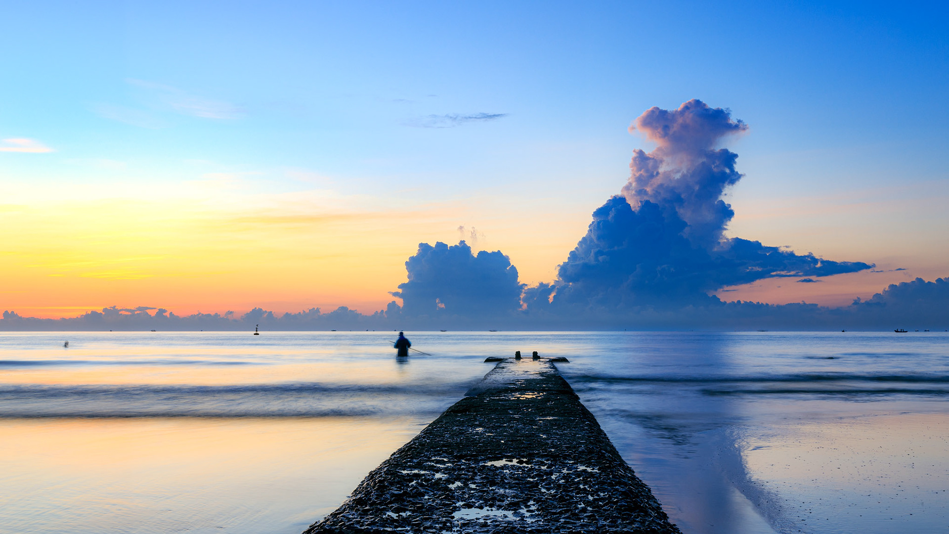 Dawn cloud with fisherman