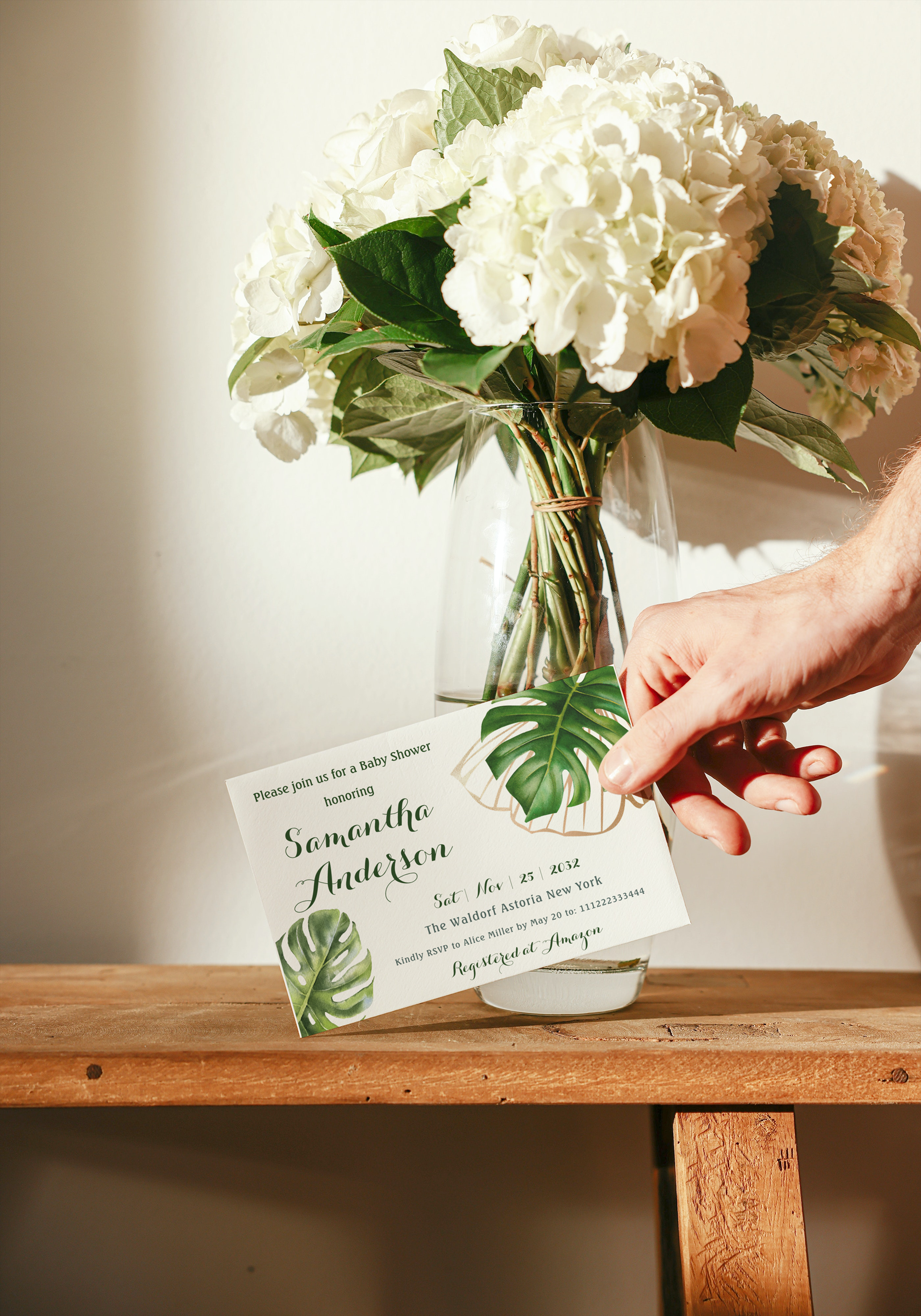 Modern Tropical Greenery Leaf Gender Neutral Baby Shower Invitation featuring fresh watercolor tropical leaf, gold foil leaf in green and white colors with pastel greenery background and minimalistic, simple design