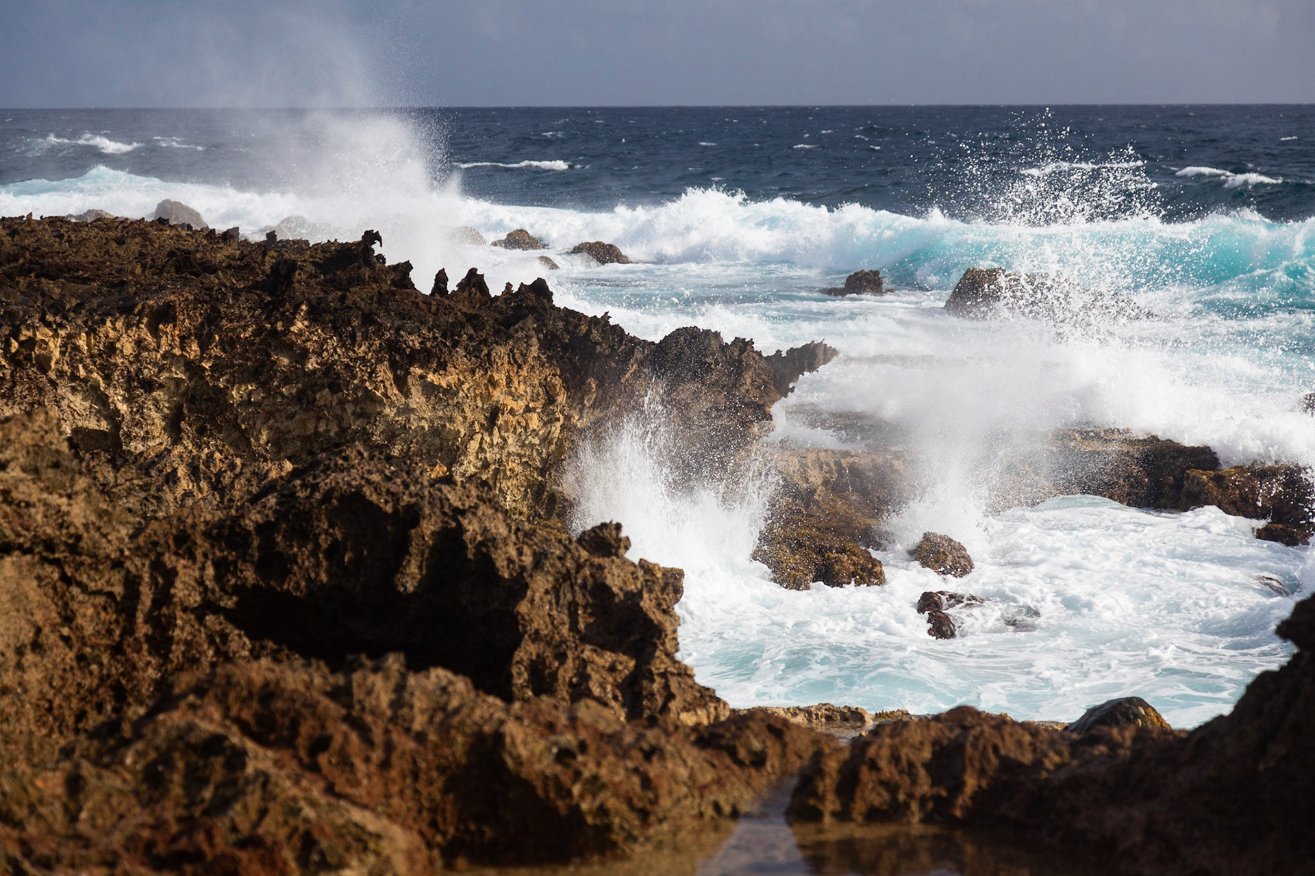 Waves Crashing Onto The Rocks At Aruba