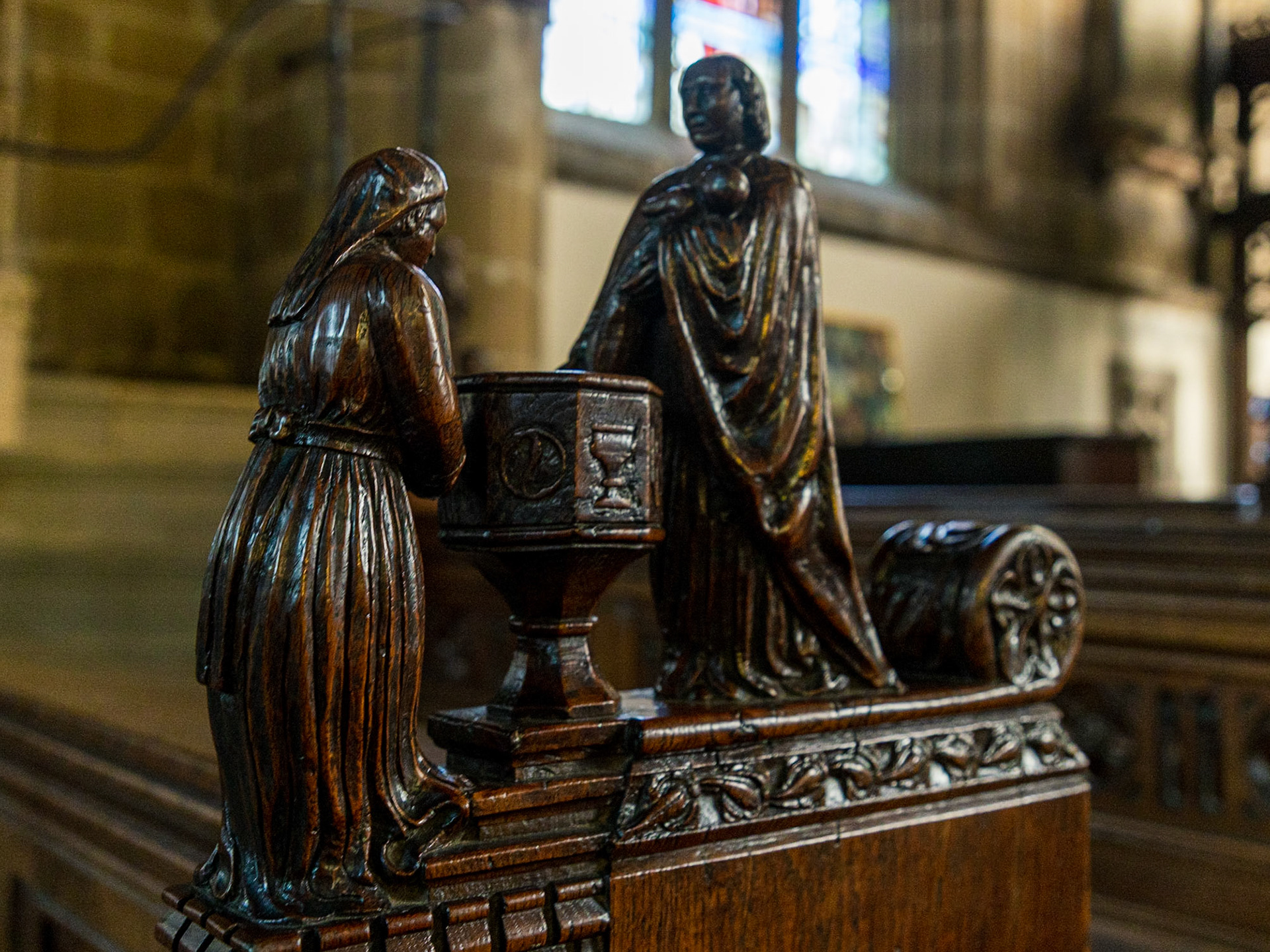 A Carving On One Of The Pews Inside The Church of St John the Baptist in Tideswell