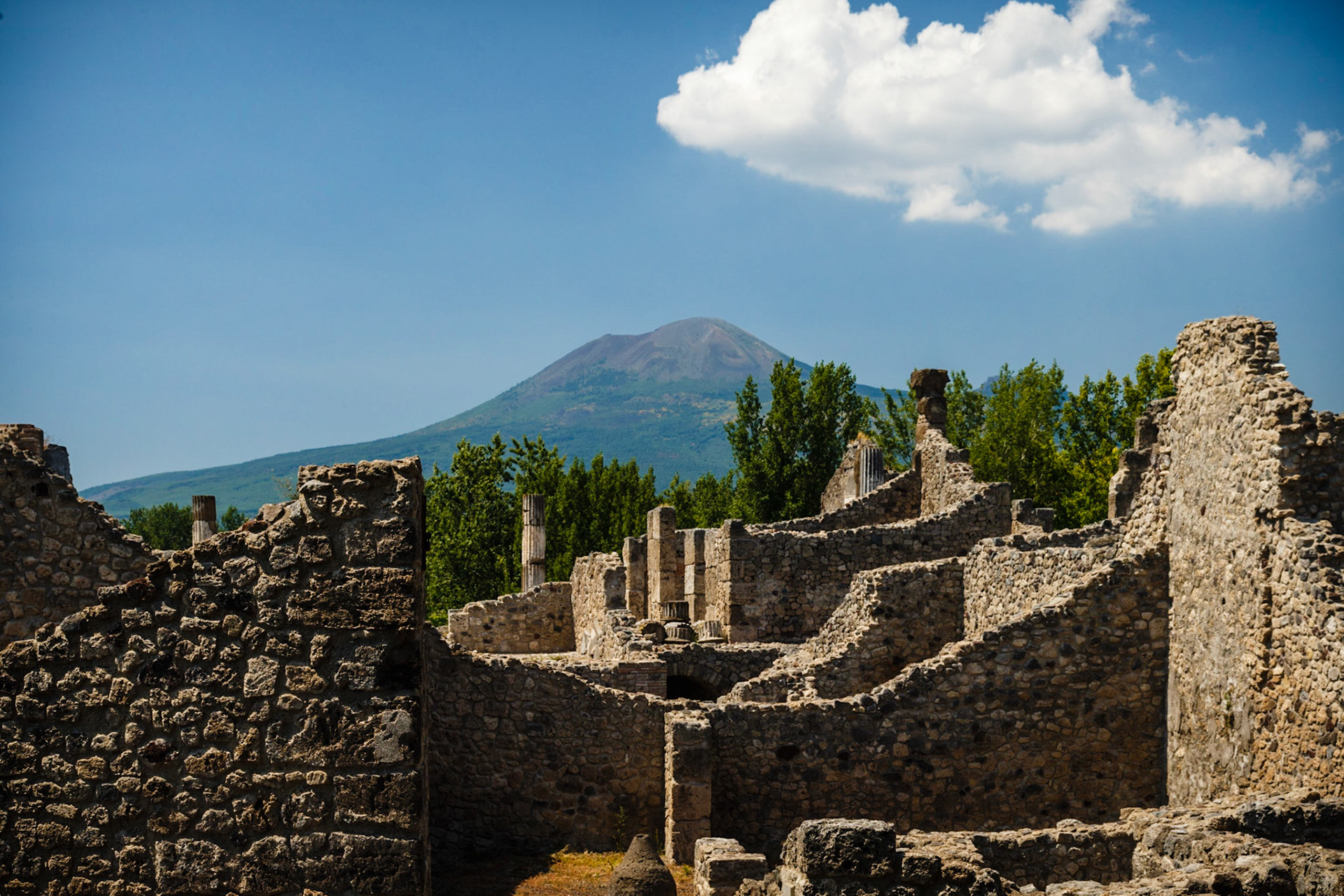 A View Over Pompeii, With Vesuvius Still Ominous In The Background