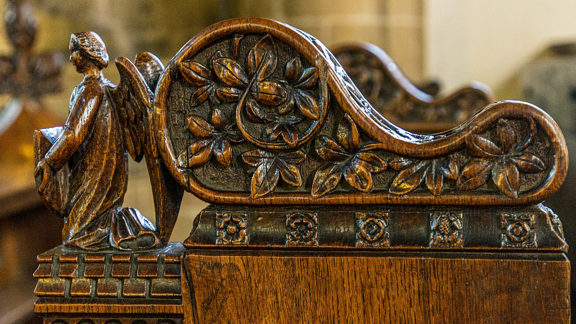 A Carving On One Of The Pews Inside The Church of St John the Baptist in Tideswell