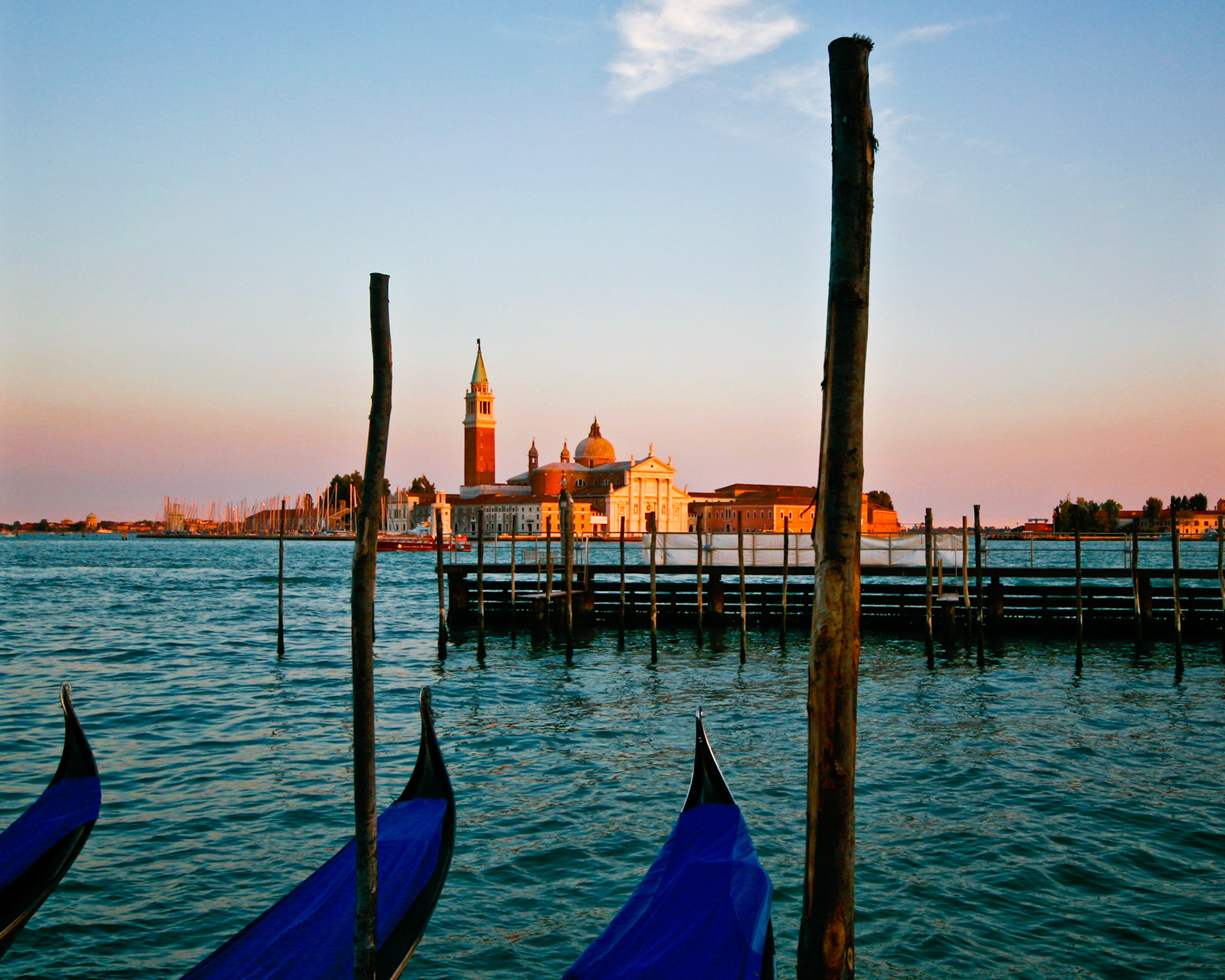 Gondolas Moored On The Grand Canal In Venice, Italy
