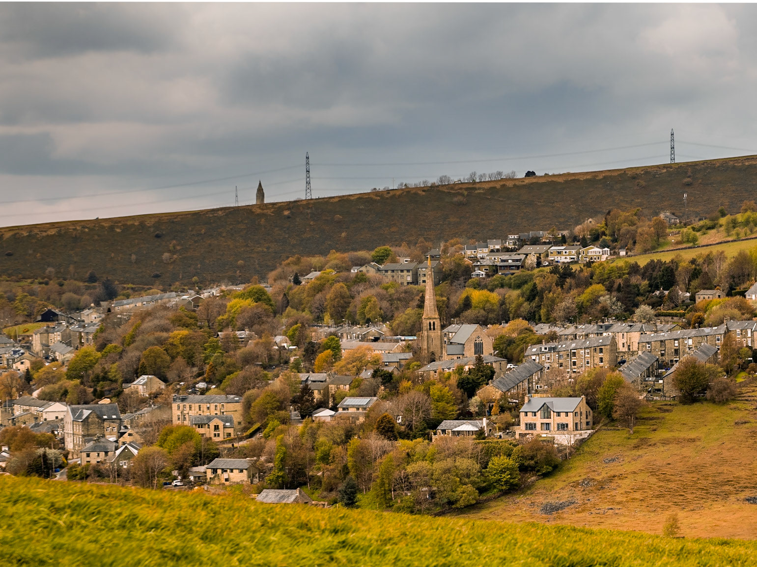 View of Roughtown Mossley with Hartshead Pike on the skyline