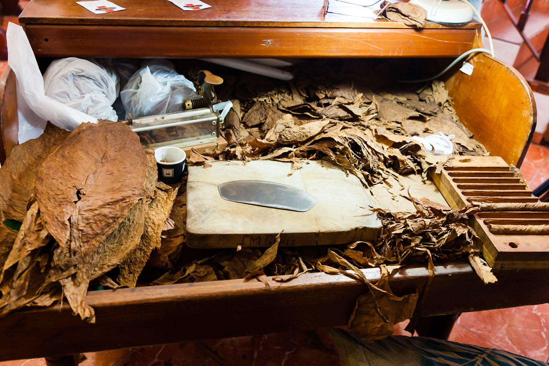 A Typical Workdesk Of A Cuban Cigar Maker, Havana, Cuba