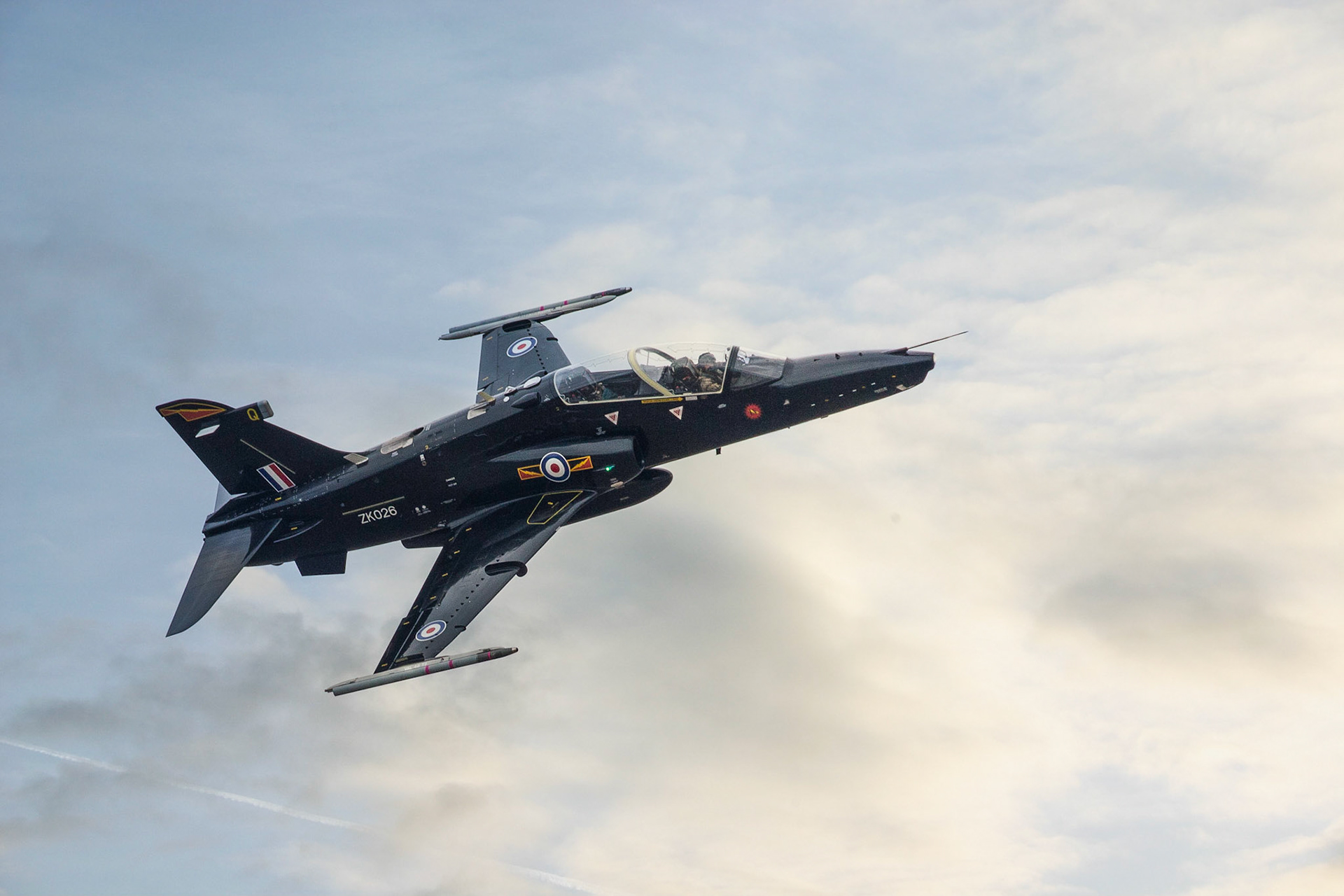 The BAE Systems Hawk is a British single-engine, jet-powered advanced trainer aircraft. It was first flown at Dunsfold, Surrey, in 1974 as the Hawker Siddeley Hawk, and subsequently produced by its successor companies, British Aerospace and BAE Systems, respectively. It has been used in a training capacity and as a low-cost combat aircraft.Operators of the Hawk include the Royal Air Force (notably the Red Arrows display team) and a considerable number of foreign military operators. The Hawk is still in production in the UK and under licence in India by Hindustan Aeronautics Limited (HAL) with over 900 Hawks sold to 18 operators around the world.