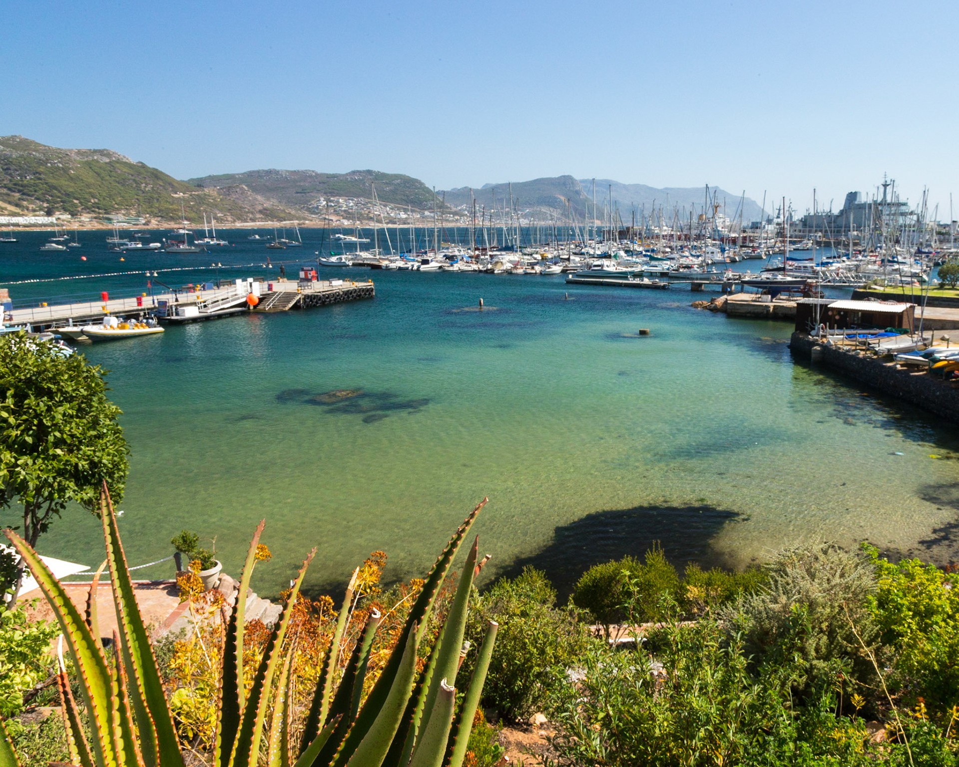 Simon's Town, sometimes spelled Simonstown, is a town near Cape Town, South Africa, which is home to the South African Navy. It is located on the shores of False Bay, on the eastern side of the Cape Peninsula. For more than two centuries it has been an important naval base and harbour (first for the Royal Navy and now the South African Navy). The town is named after Simon van der Stel, an early governor of the Cape Colony.