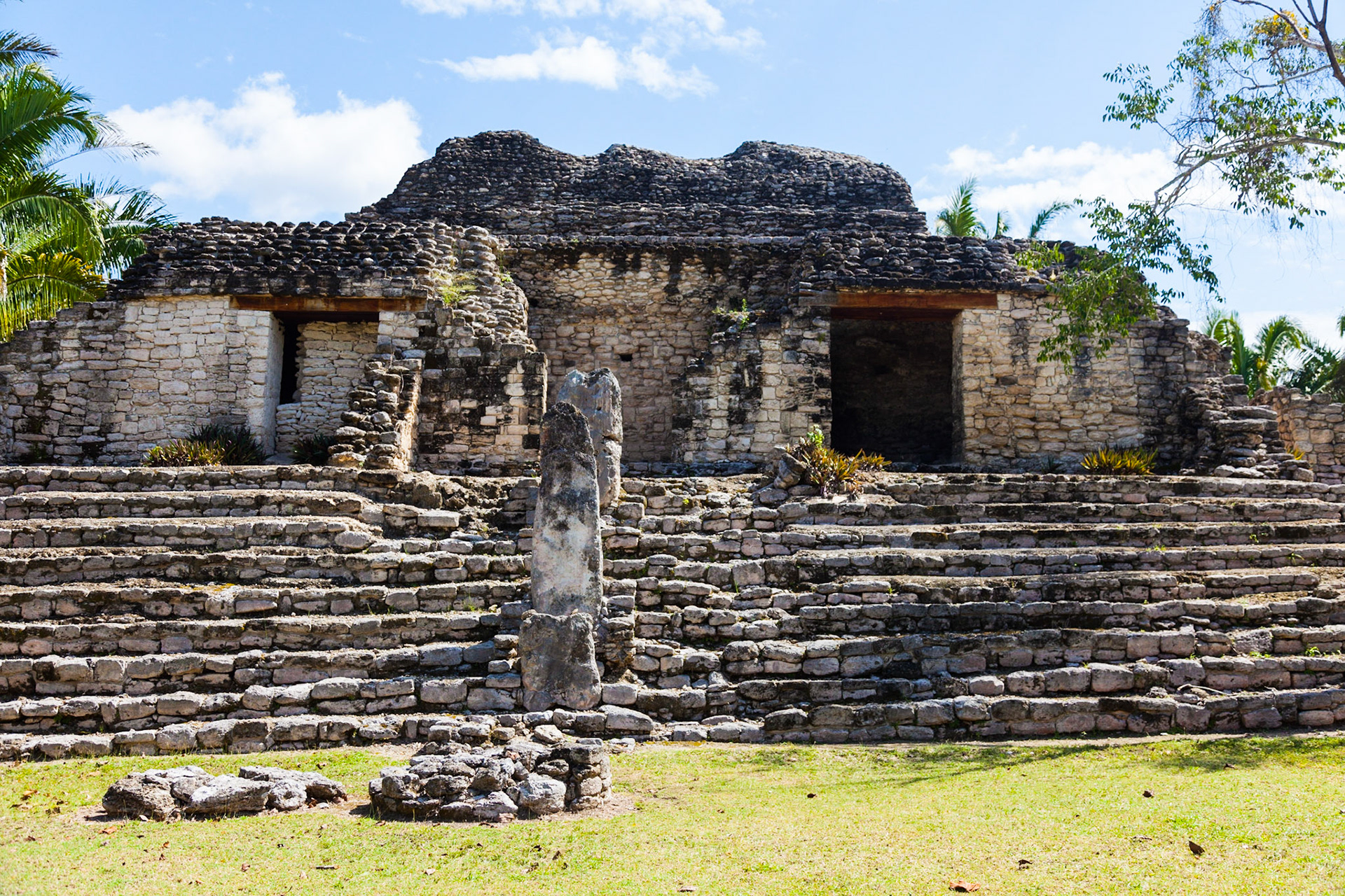 Kohunlich (X-làabch'e'en in Modern Mayan) is a large archaeological site of the pre-Columbian Maya civilization, located on the Yucatán Peninsula in the state of Quintana Roo about 25 km east of the Rio Bec region, and about 65 km west of Chetumal on Highway 186, and 9 km south of the road. The Spanish name does not actually derive from Mayan but from the English Cohune Ridge where cohune palm grew.
