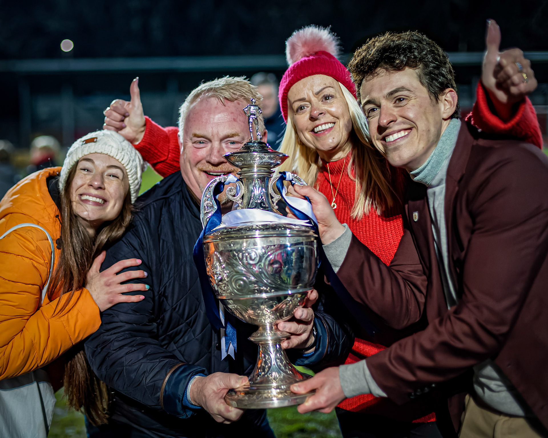 The Owners and Their Family With The Cup