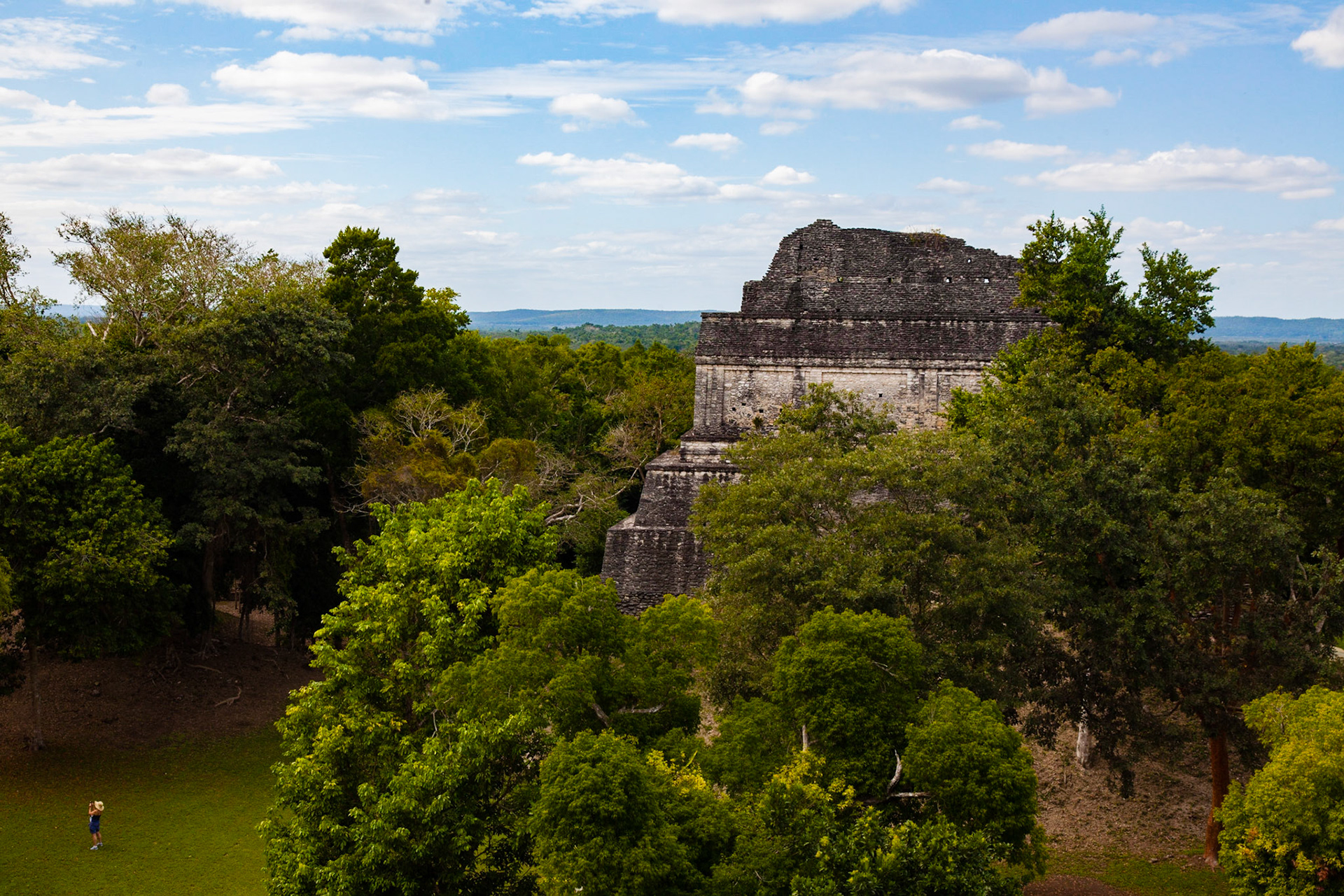 Kohunlich (X-làabch'e'en in Modern Mayan) is a large archaeological site of the pre-Columbian Maya civilization, located on the Yucatán Peninsula in the state of Quintana Roo about 25 km east of the Rio Bec region, and about 65 km west of Chetumal on Highway 186, and 9 km south of the road. The Spanish name does not actually derive from Mayan but from the English Cohune Ridge where cohune palm grew.