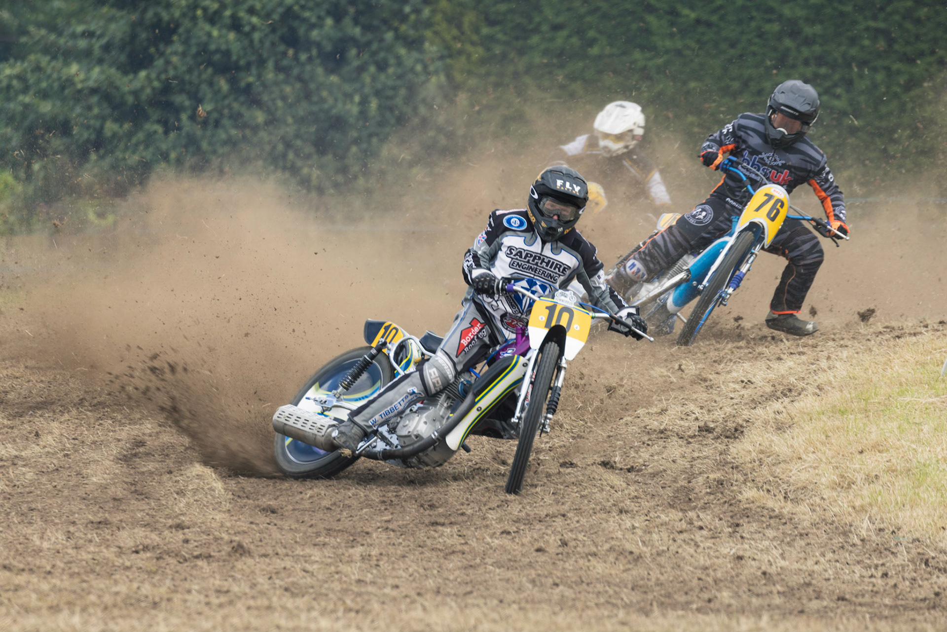 Tony Atkin on the Trak Plus 500cc in front of Graham Bell