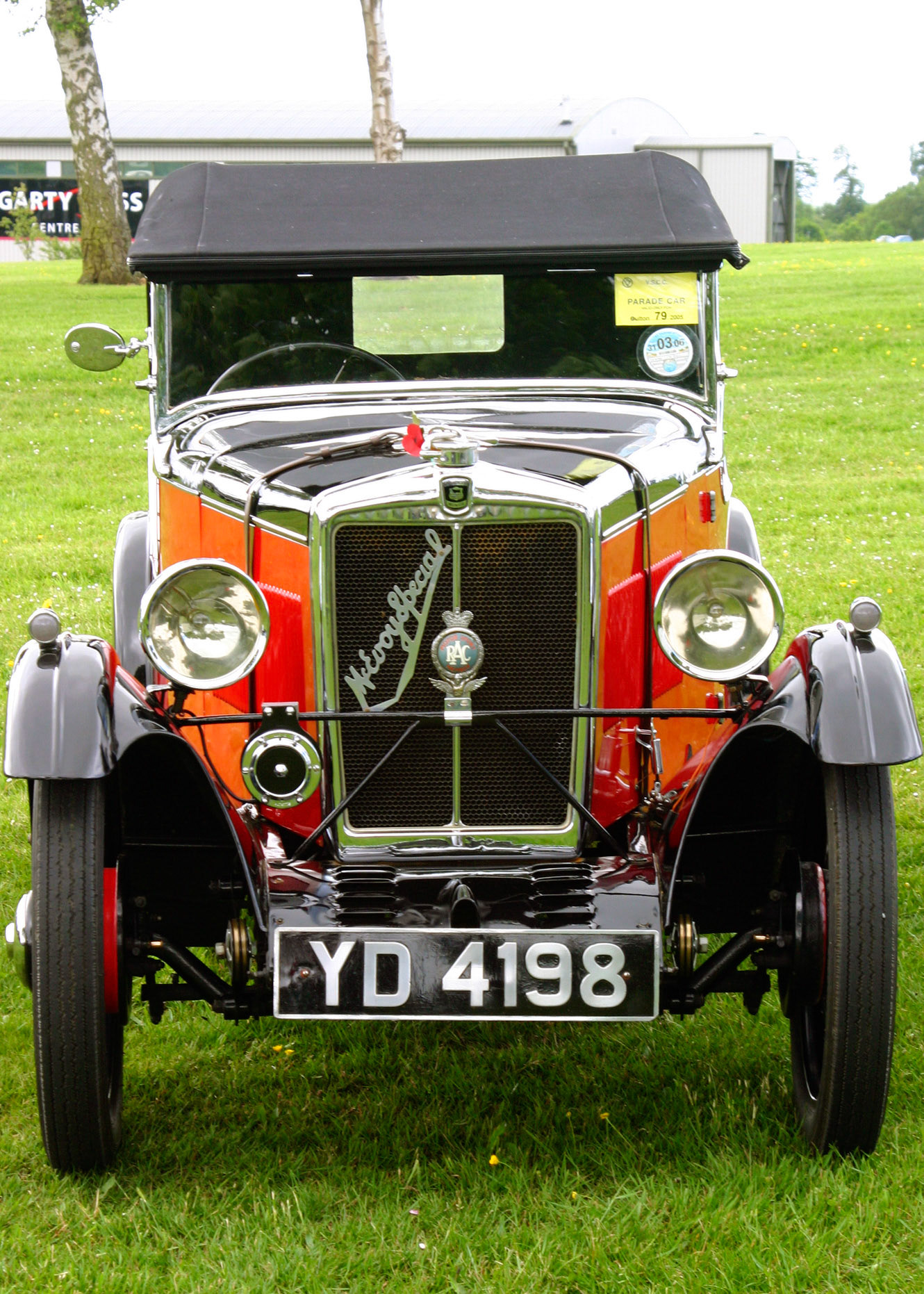 1932 McEvoy Special Model 60.  Michael McEvoy was an engineer who founded McEvoy Motorcycles in Derby in 1925. The company produced very fast motorcycles through 1929, when the money behind the company was killed racing on the Isle of Man. McEvoy moved on but eventually came back around to motorized transport and produced this, the McEvoy Special.Based on the Wolseley Star/Morris Minor of the late 1920s/early 1930s, the McEvoy Special shared those cars’ mechanicals but sported a body from Jensen. This seemingly tiny car will seat four and cost £149 when new.This particular Special is based on a 1932 Morris Minor and is powered by that car’s 847cc straight-four that made 20 horsepower in Morris form. McEvoys could be had as a standard “Model 60” or, when fitted with an upgraded carburetor, a “Model 70.”This car has known history back to 1962. The owner put it in a museum in 1973 where it underwent a 16 year restoration. It exited the museum in 1989 and has been used extensively since.