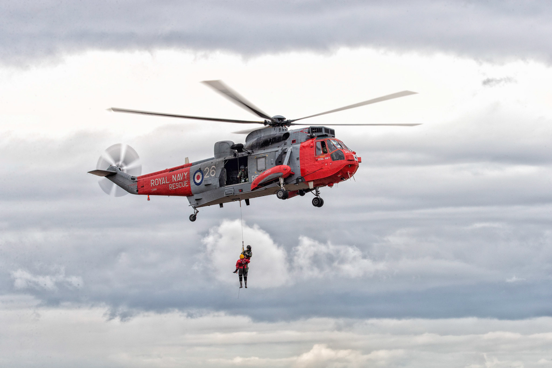 In British service, the Westland Sea King provided a wide range of services in both the Royal Navy and the Royal Air Force. As well as wartime roles in the Falklands War, the Gulf War, the Balkans conflict, the Iraq War and the Afghanistan War, the Sea King is perhaps most well known in its capacity as a Royal Navy Search and Rescue (red and grey livery) and RAF Search and Rescue Force (yellow livery) helicopter. The Sea King was also adapted to meet the Royal Navy's requirement for a ship-based airborne early warning platform.