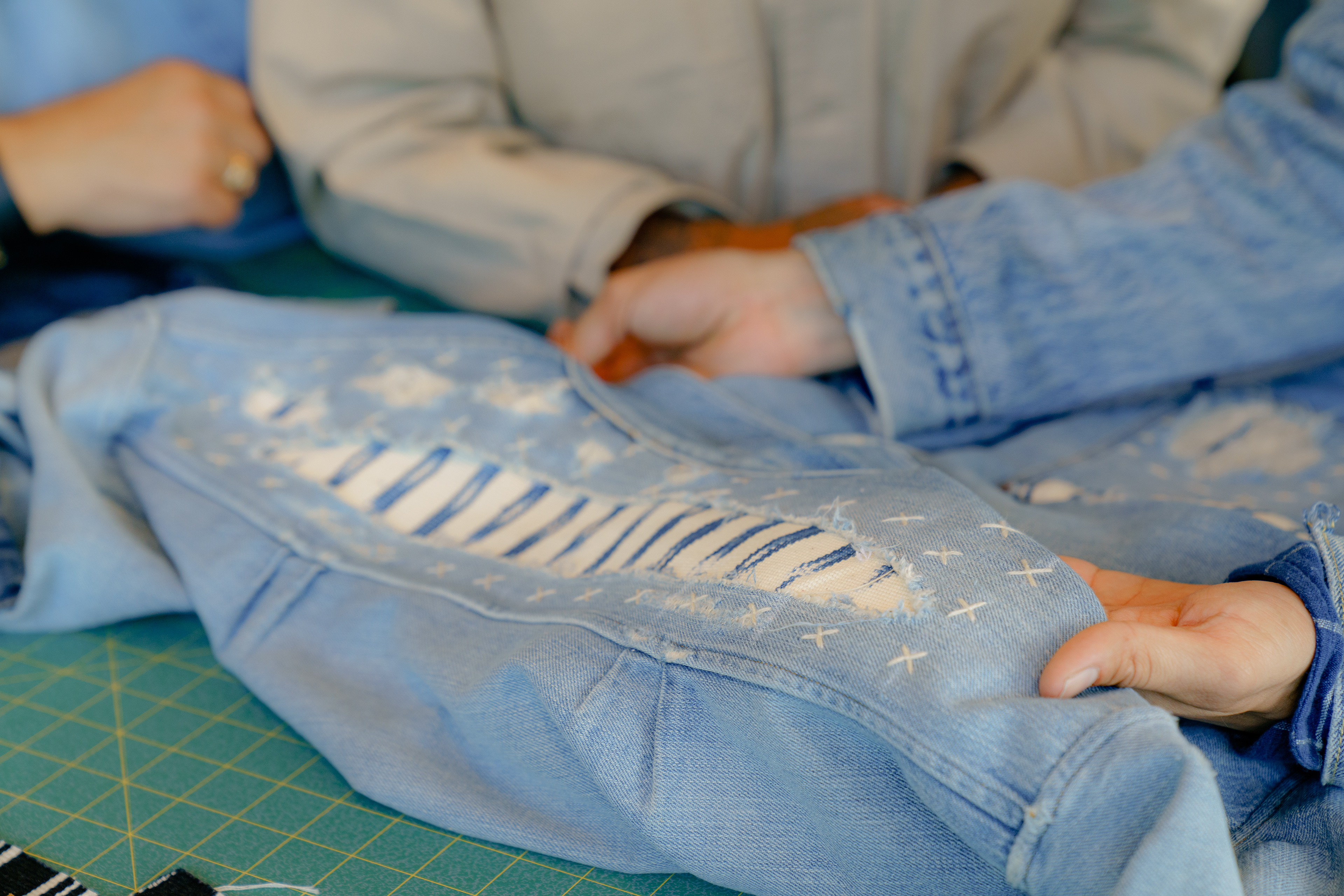 Sashiko mending holds together vintage blouson with Mercardo Global fabric
