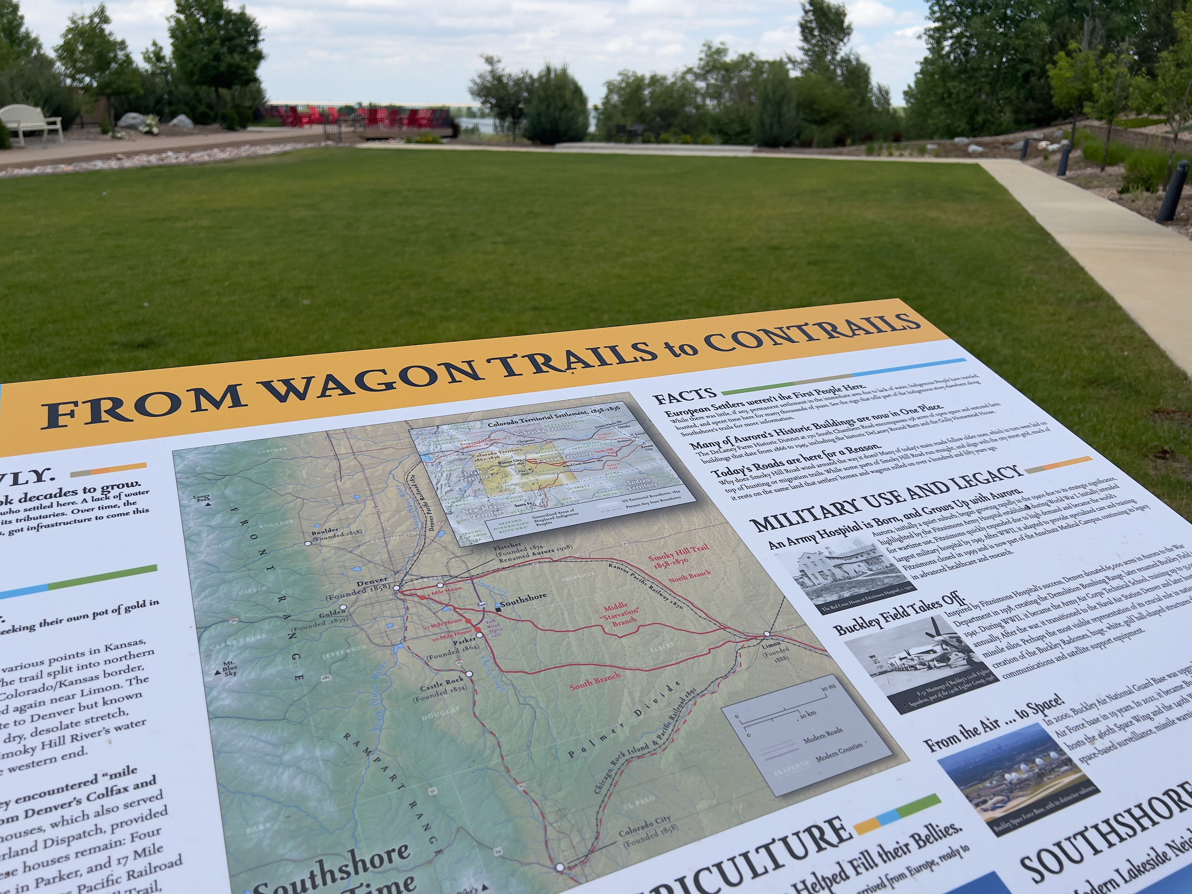A detail of a sign about the post-contact history of southshore, titled "From Wagon Trails to Contrails"