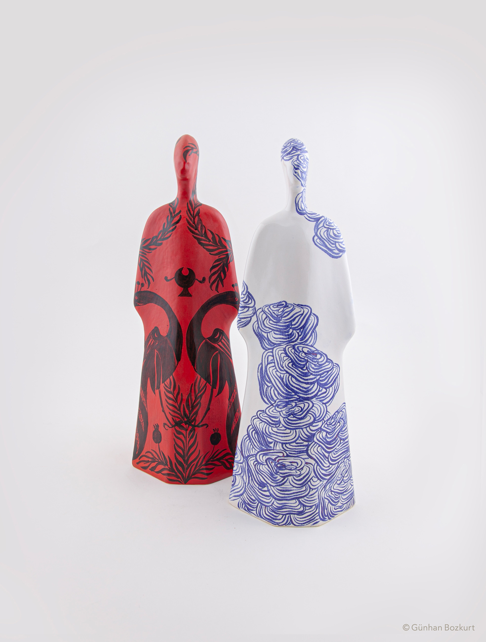 Women Figures in Kaftans / ceramic sculptures, each h. 38 cm, w. 13 cm