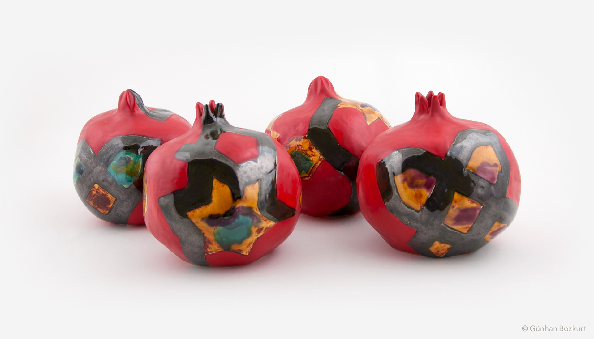 Seljuk Pomegranates / ceramic sculptures, each h. 11 cm