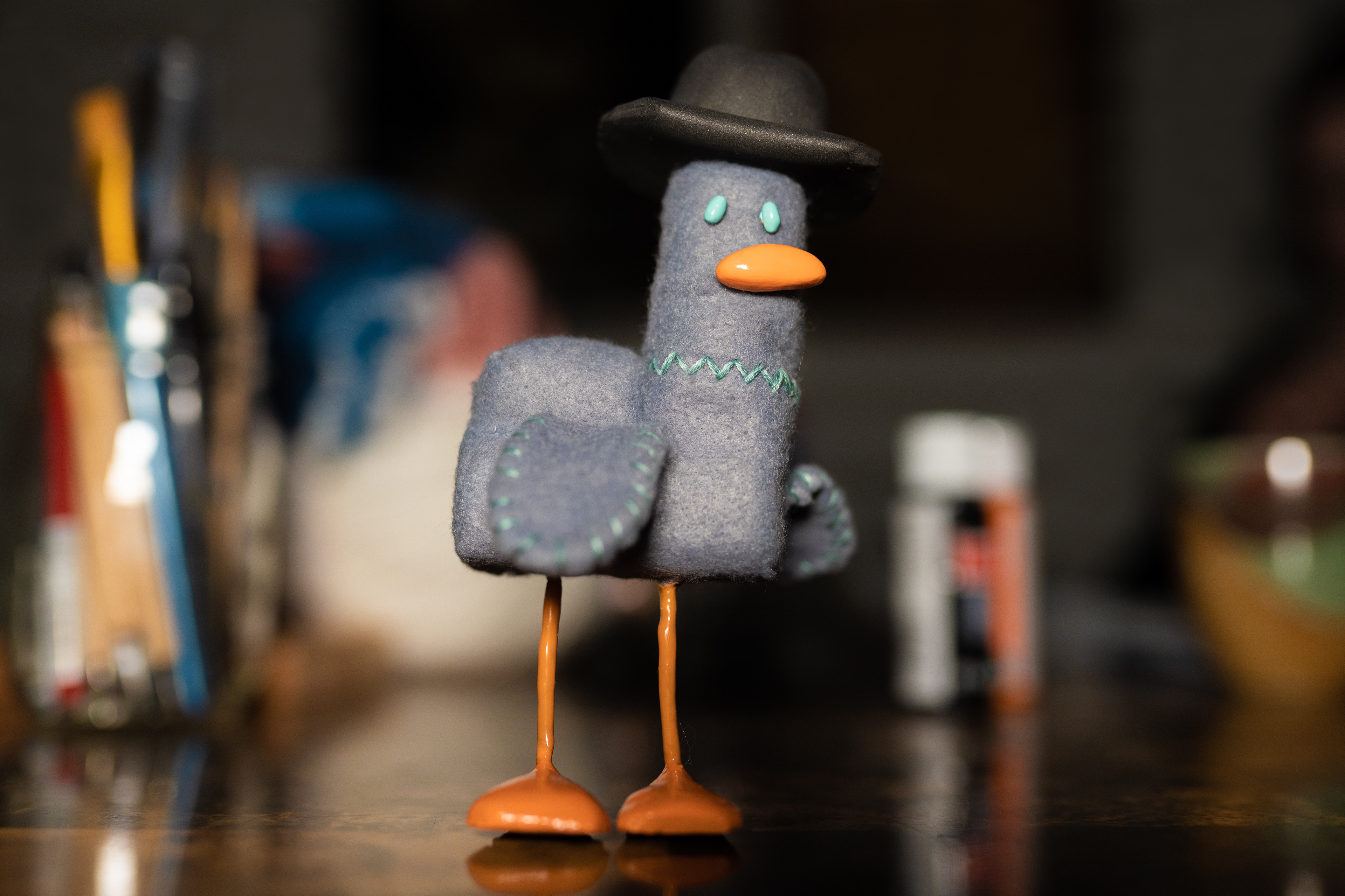 Sam Spadebill, a "green" pigeon new to the noir world.