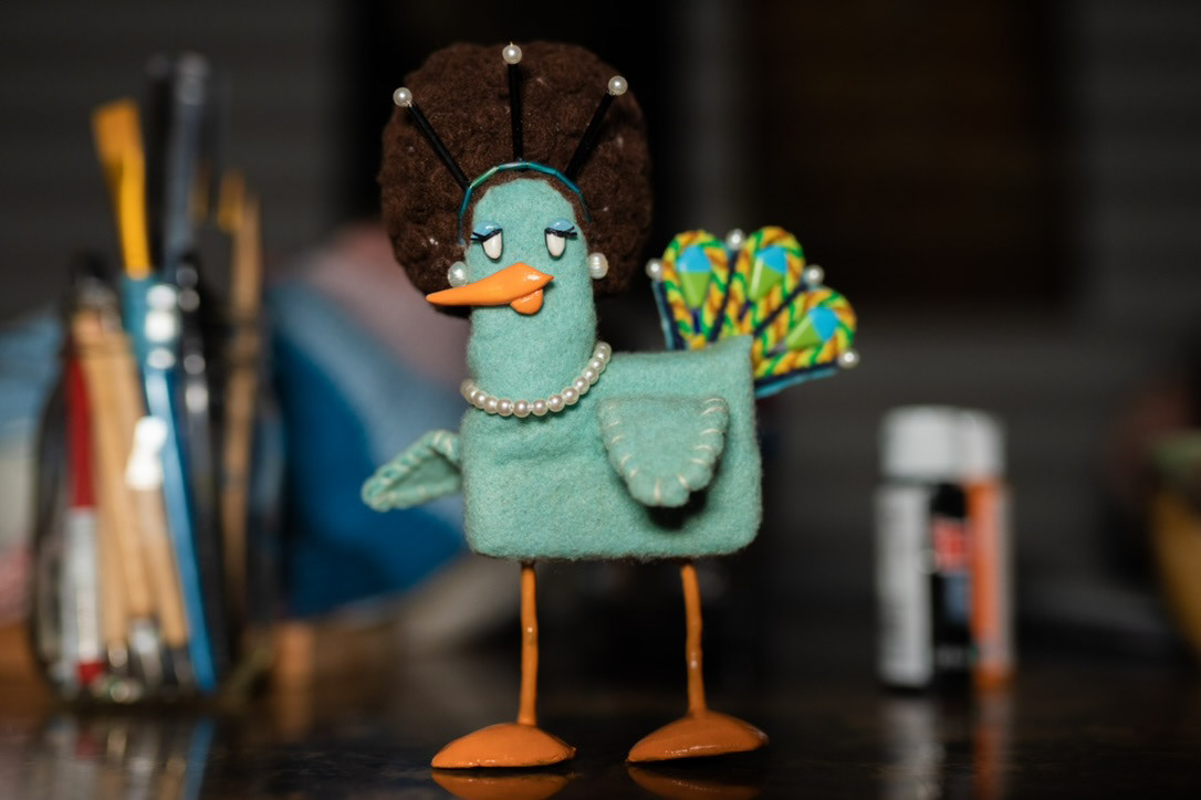 Peggy Peacock, the femme fatale jazz singer at "BirdHaus."