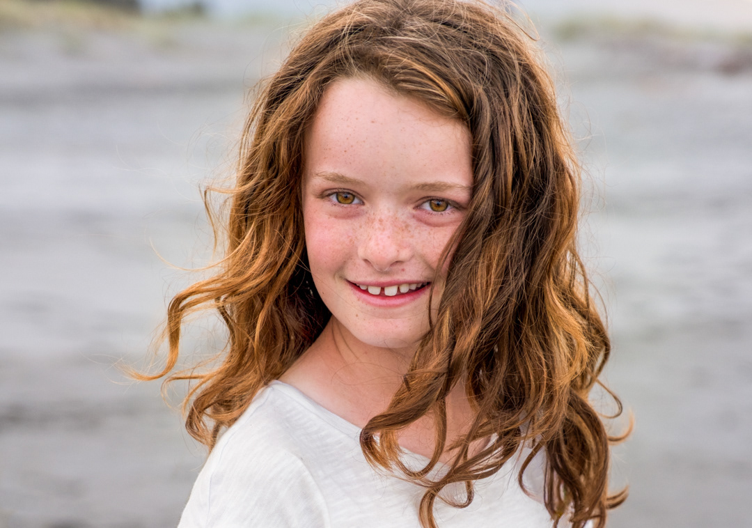 Portrait taken during a family photo shoot on the beach, Bay of Plenty