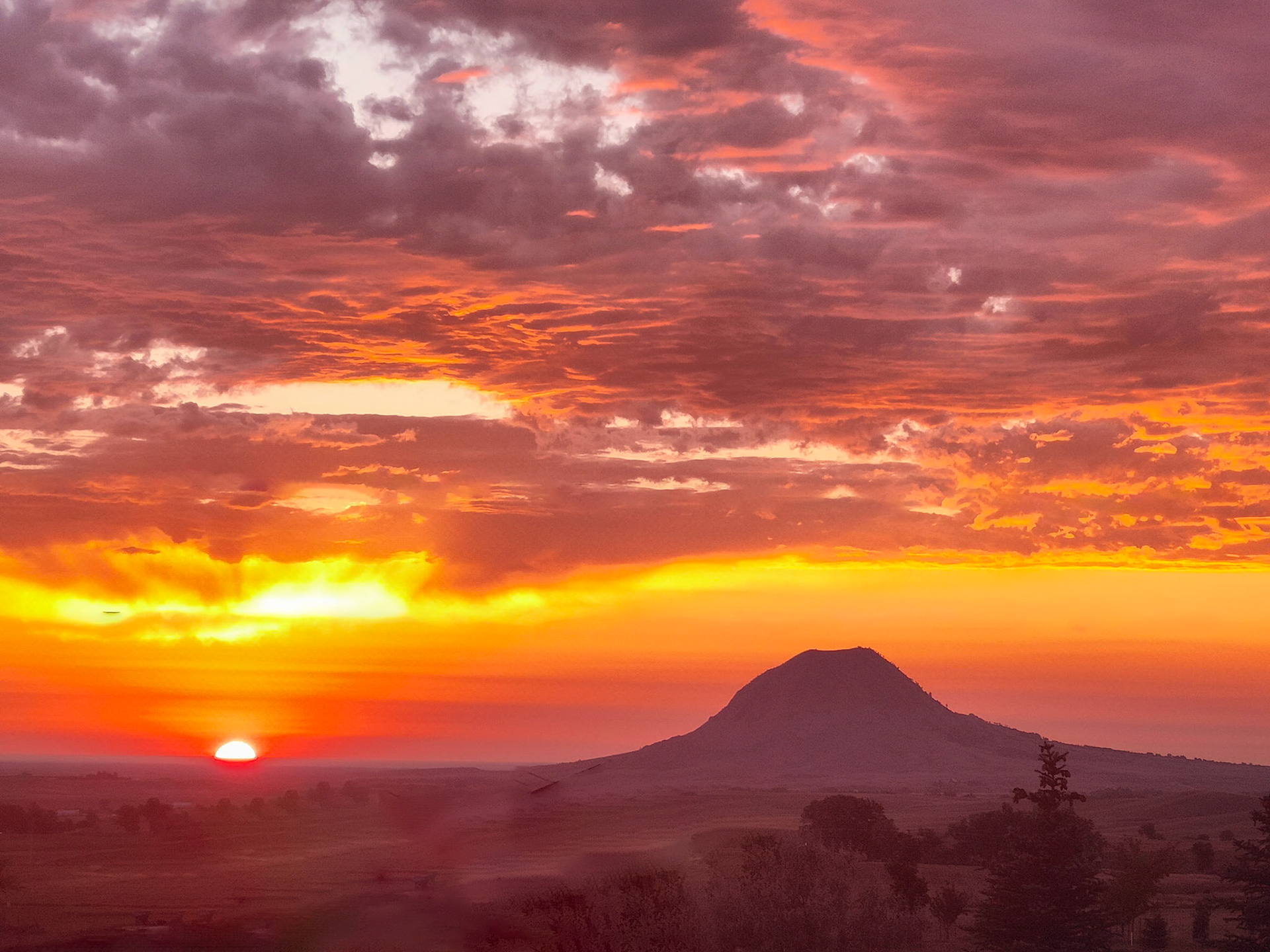 Whitewood, South Dakota - Sunrise by Bear Butte