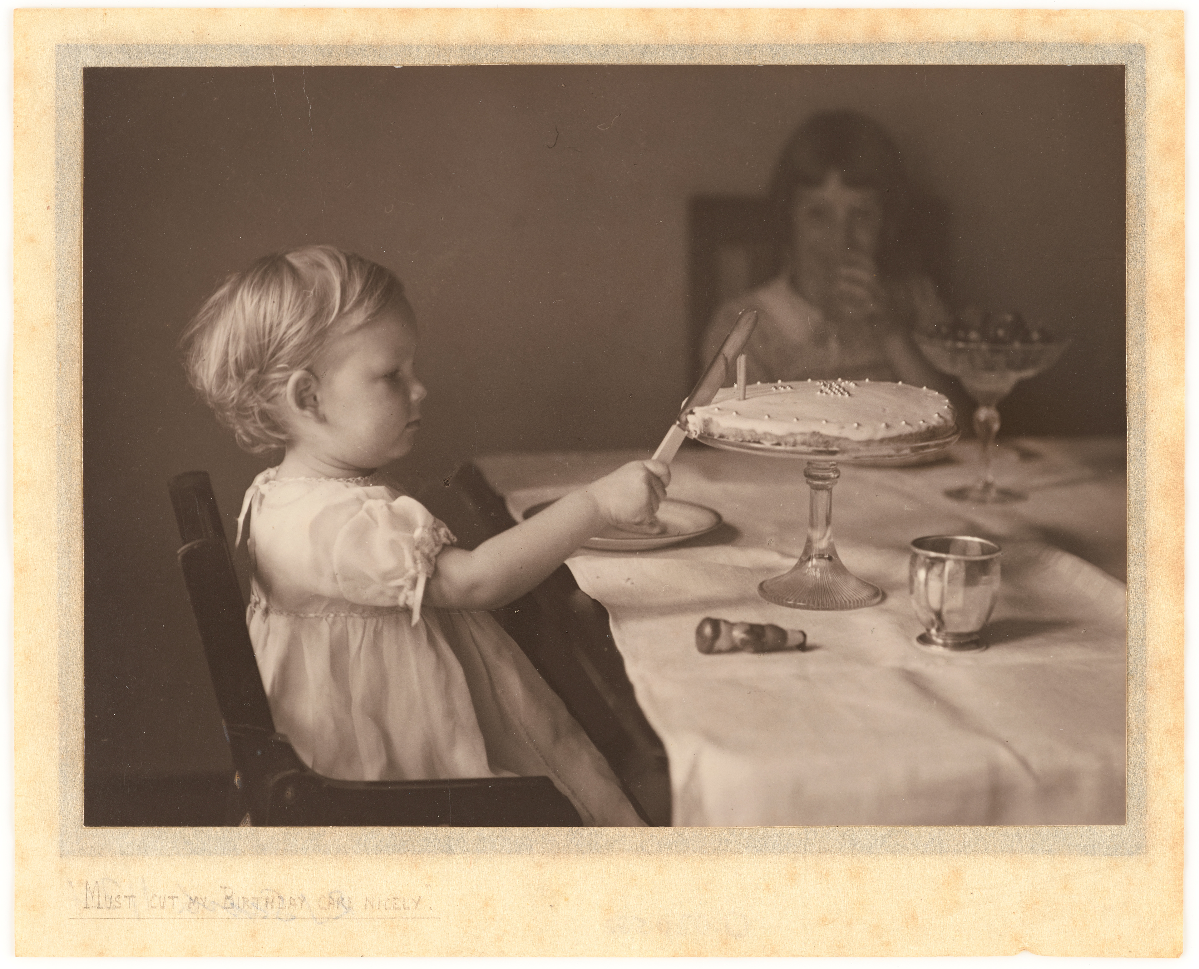 “Must cut my birthday cake nicely.” 📷 Roland Searle, c. 1930,  Original image from @te_papa, (O.020582)
