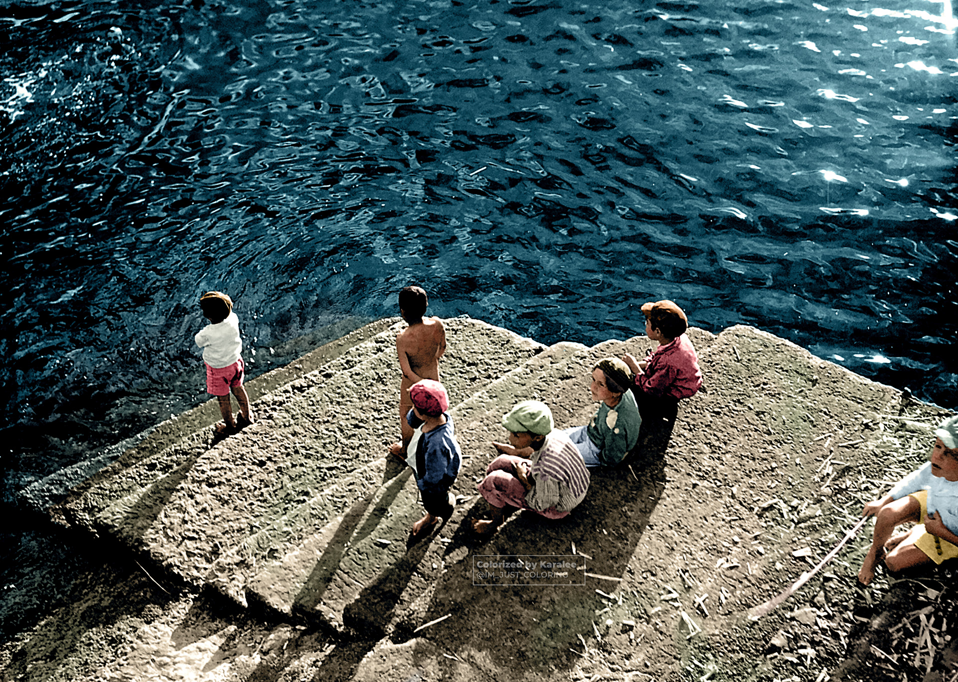 Children on a staircase by the sea ca. 1934 • • Original image from @nationaalarchief