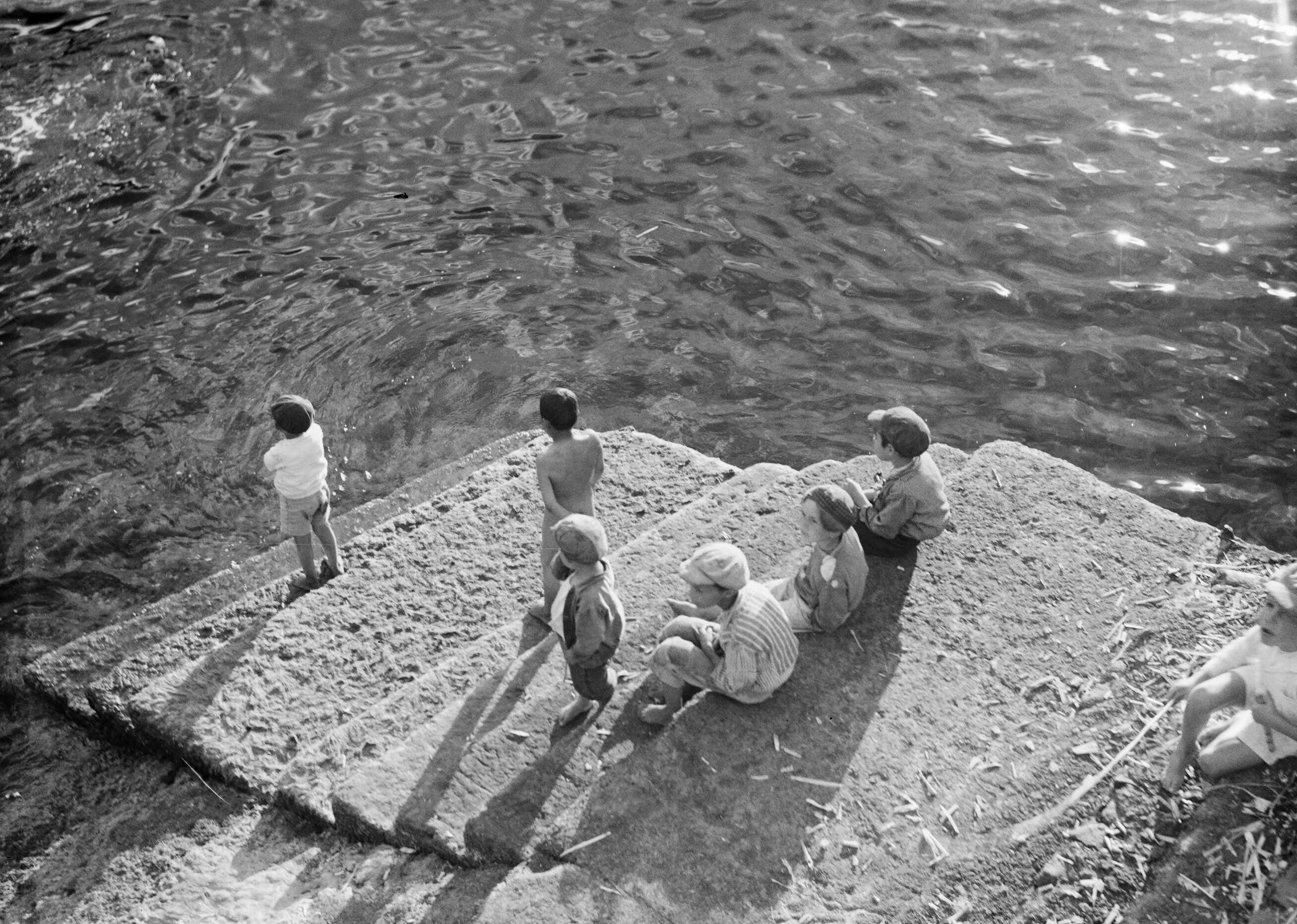 Children on a staircase by the sea ca. 1934 • • Original image from @nationaalarchief