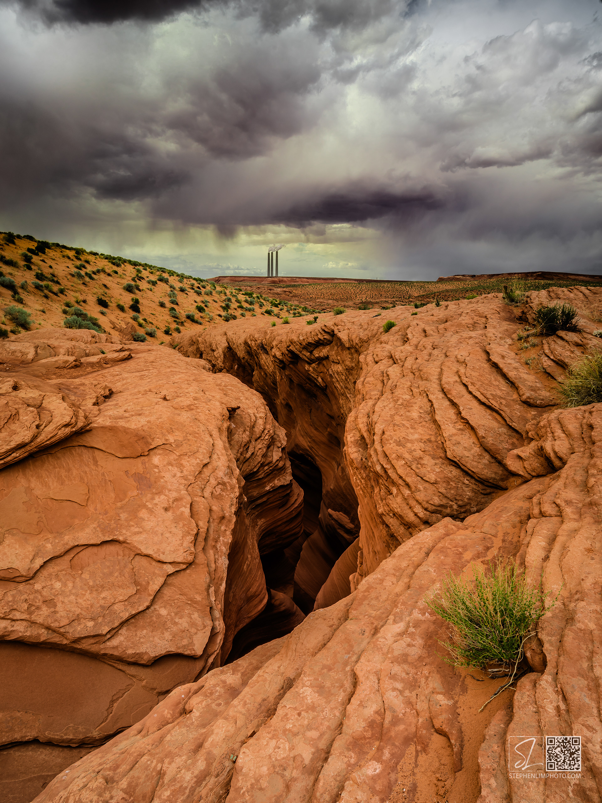 Chasm of Man:  Clouds brewing over a slot canyon in Arizona