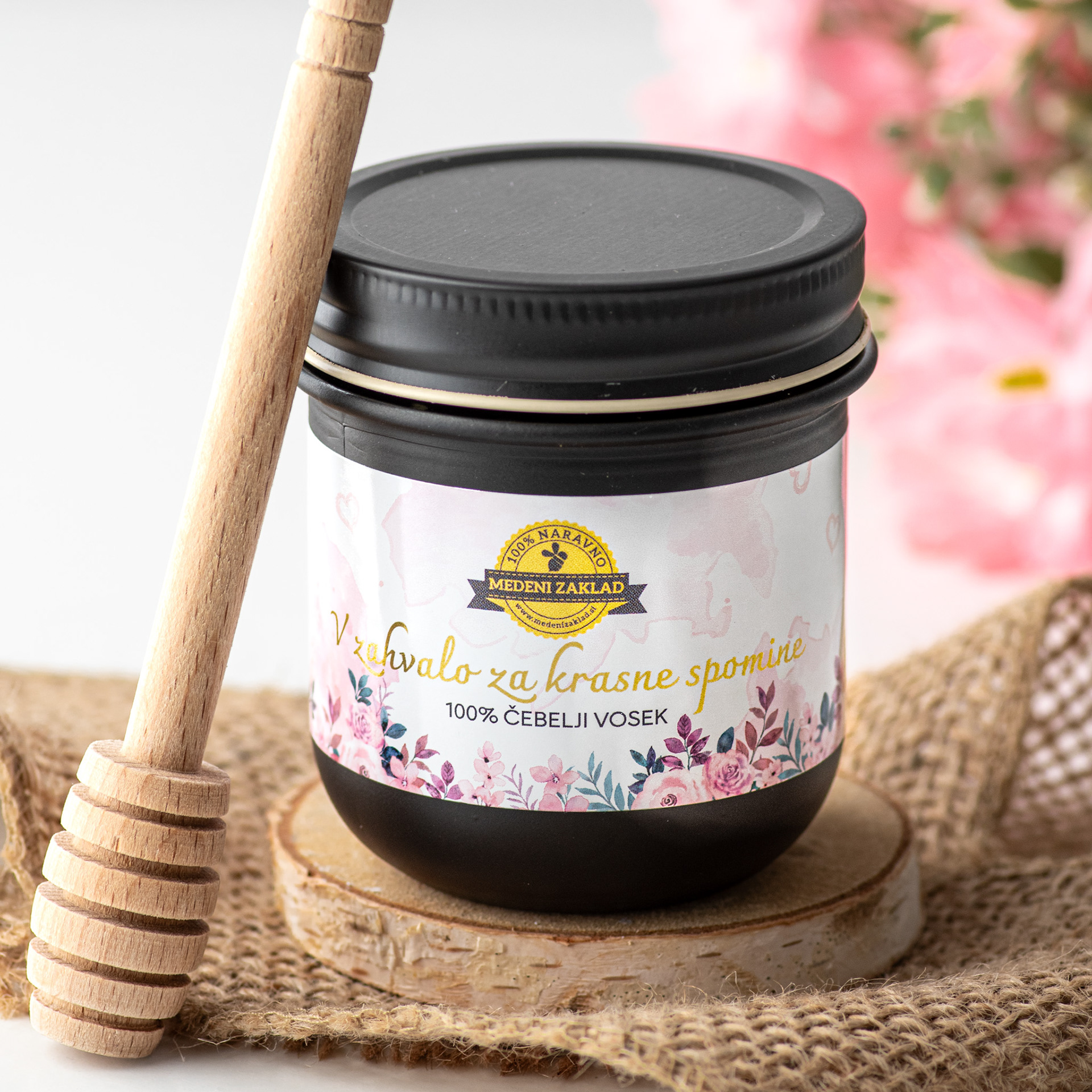 Scented candle with honey and flowers
