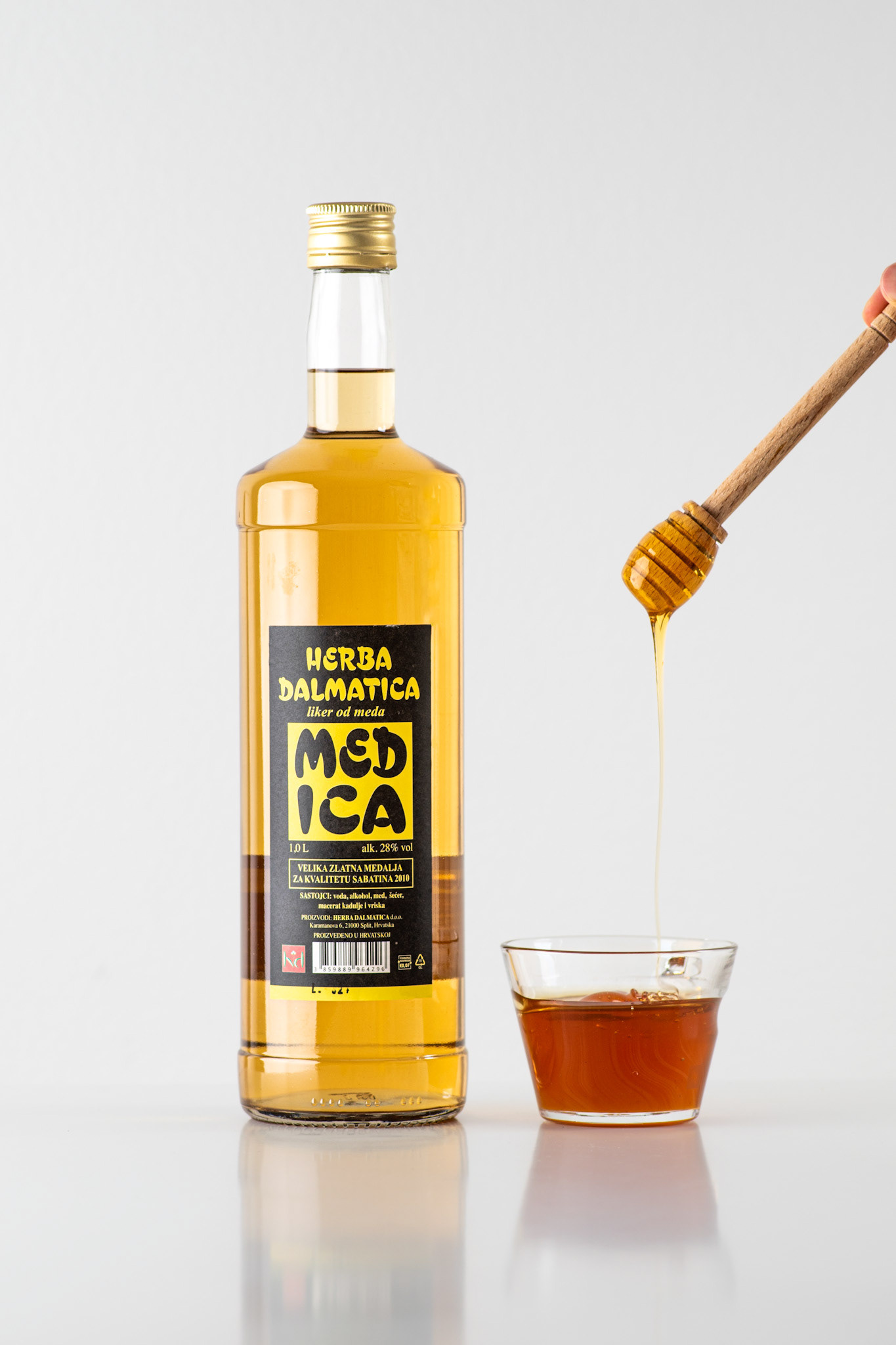 honey liquor on white background with honey