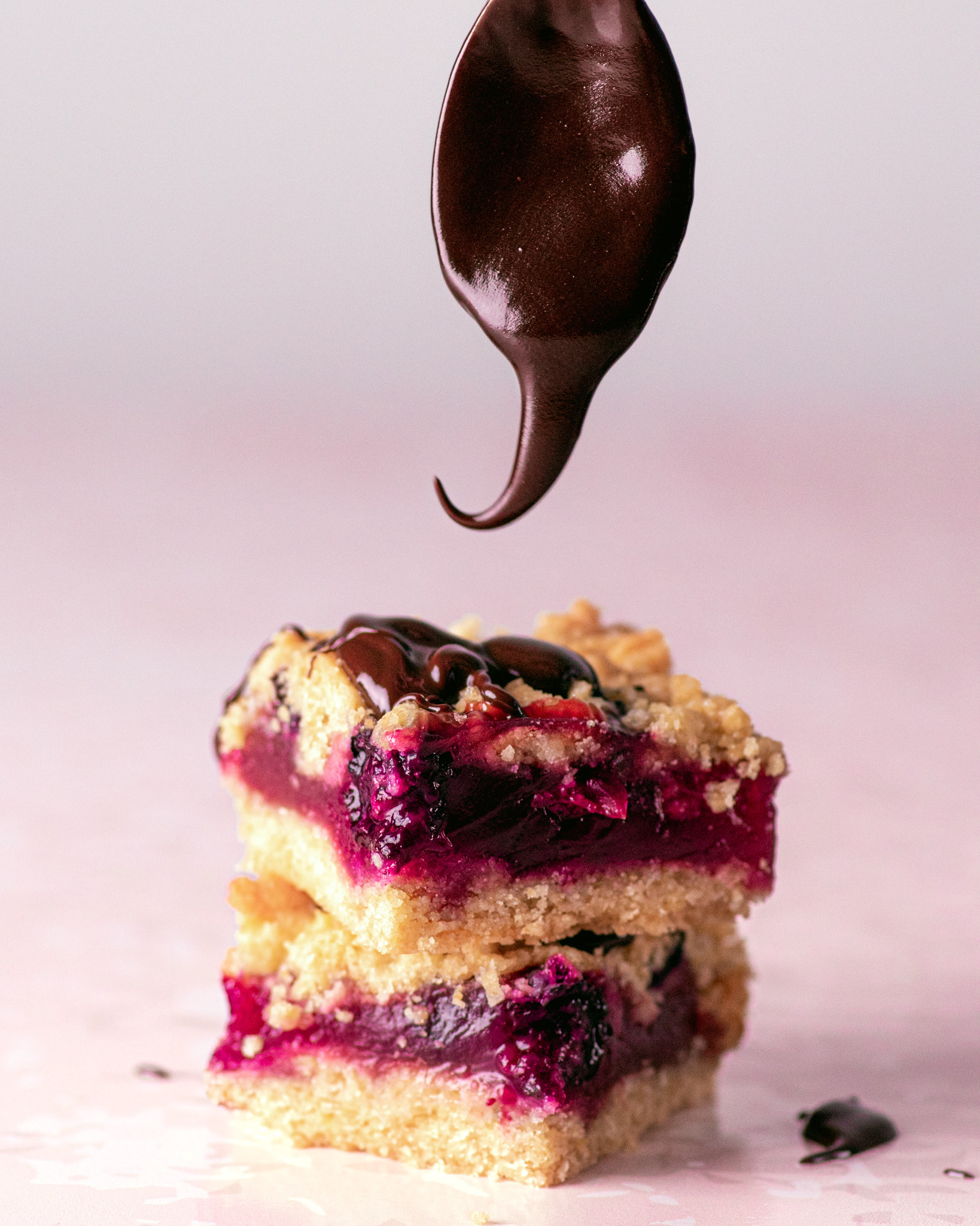 berry pie in stack with chocolate swirl over it