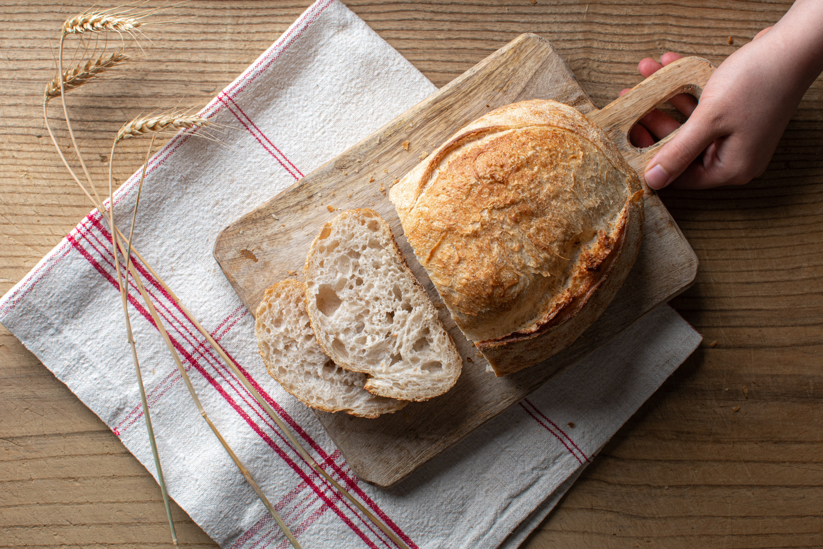 bread on wooden table and a board