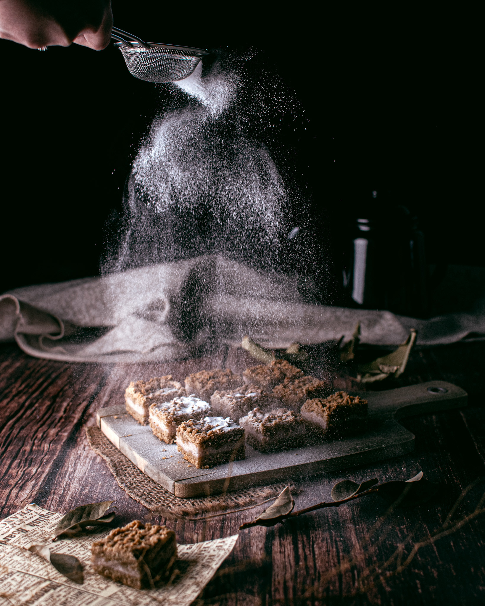 sugar sprinkle on pie bars on wooden table in vintage style