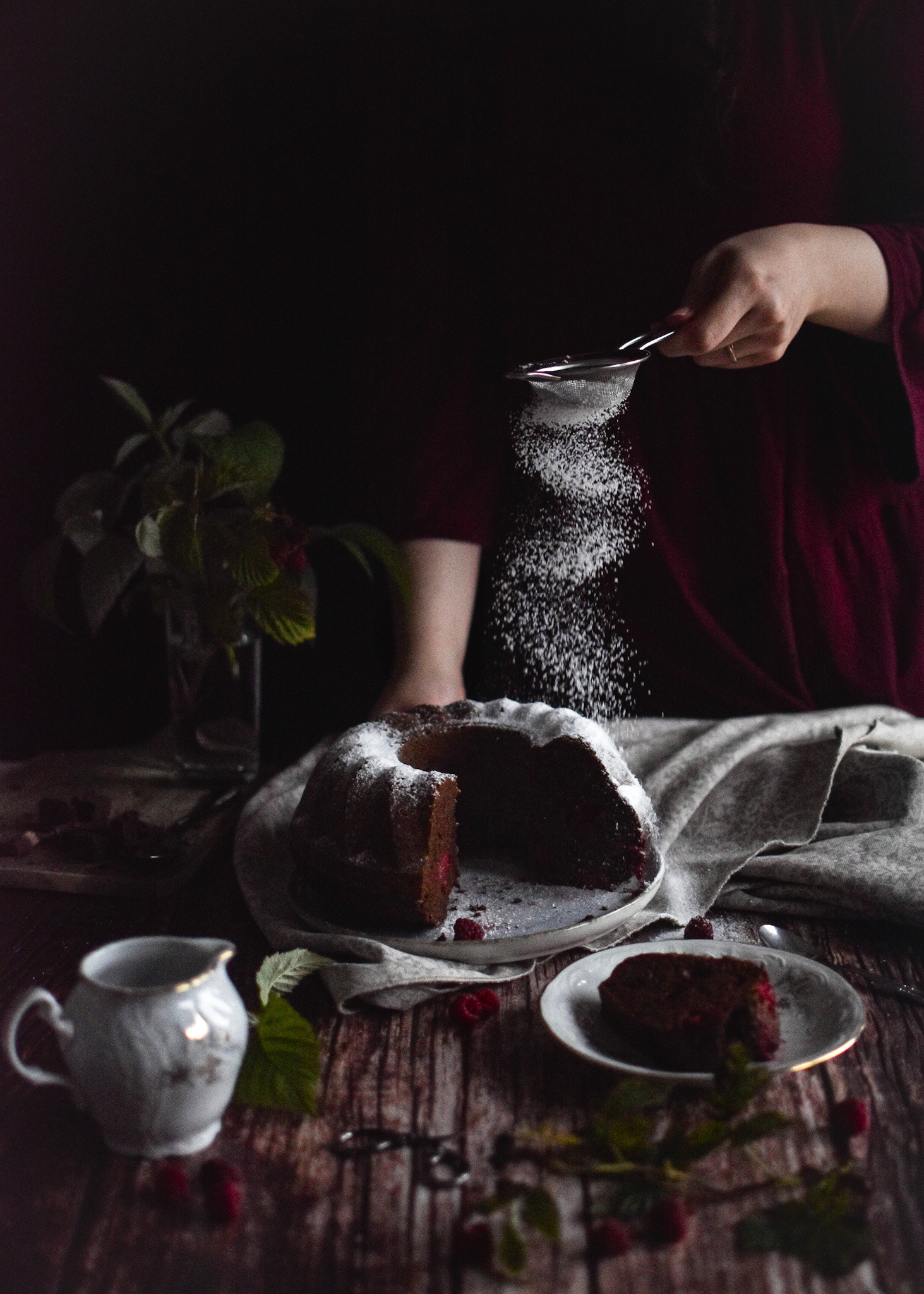 Powder sugar sprinkle on raspberry bundt cake