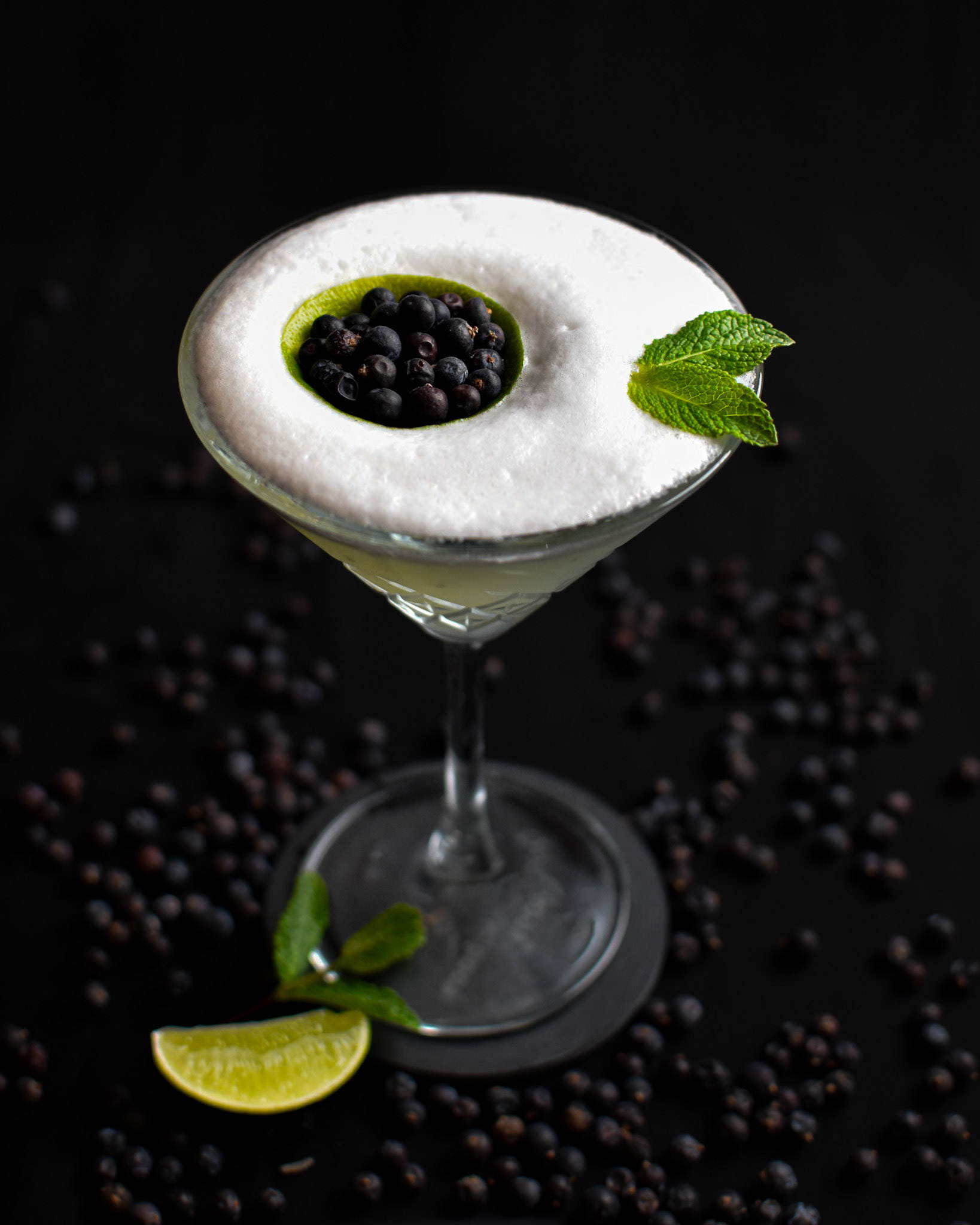 cocktail with berries and mint leaves